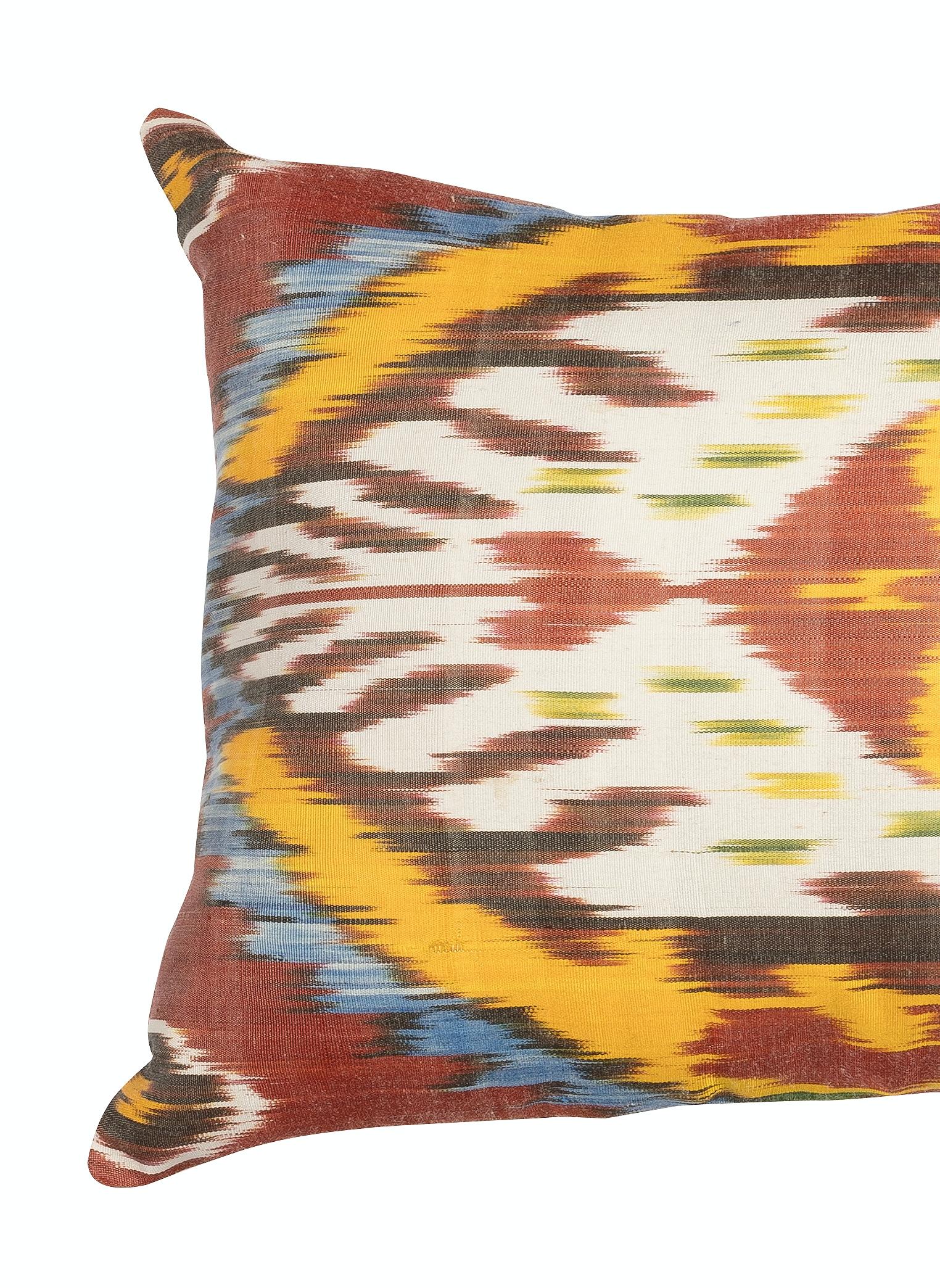 An ikat cushion cover is a special type of cushion cover that utilizes a traditional hand-woven fabric dyeing technique called ikat. The ikat technique involves pre-dyeing specific areas of the fabric with the desired design, and then weaving them