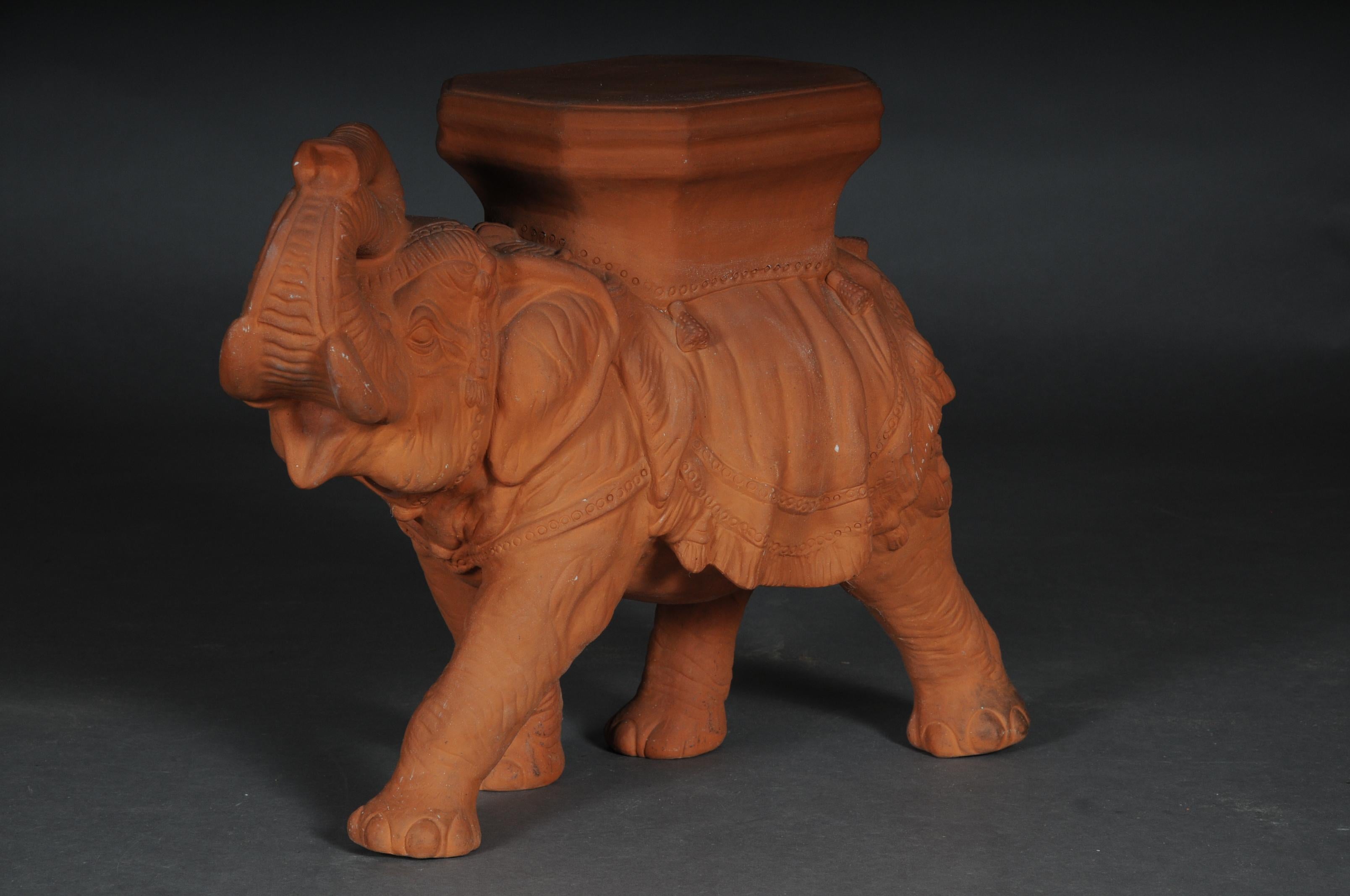 Terracotta decorative elephant, Italy, 20th century.

Walking Indian elephant made of terracotta. Quality workmanship with postament on the back which can be used as a shelf or as a flower column.

(V-152).