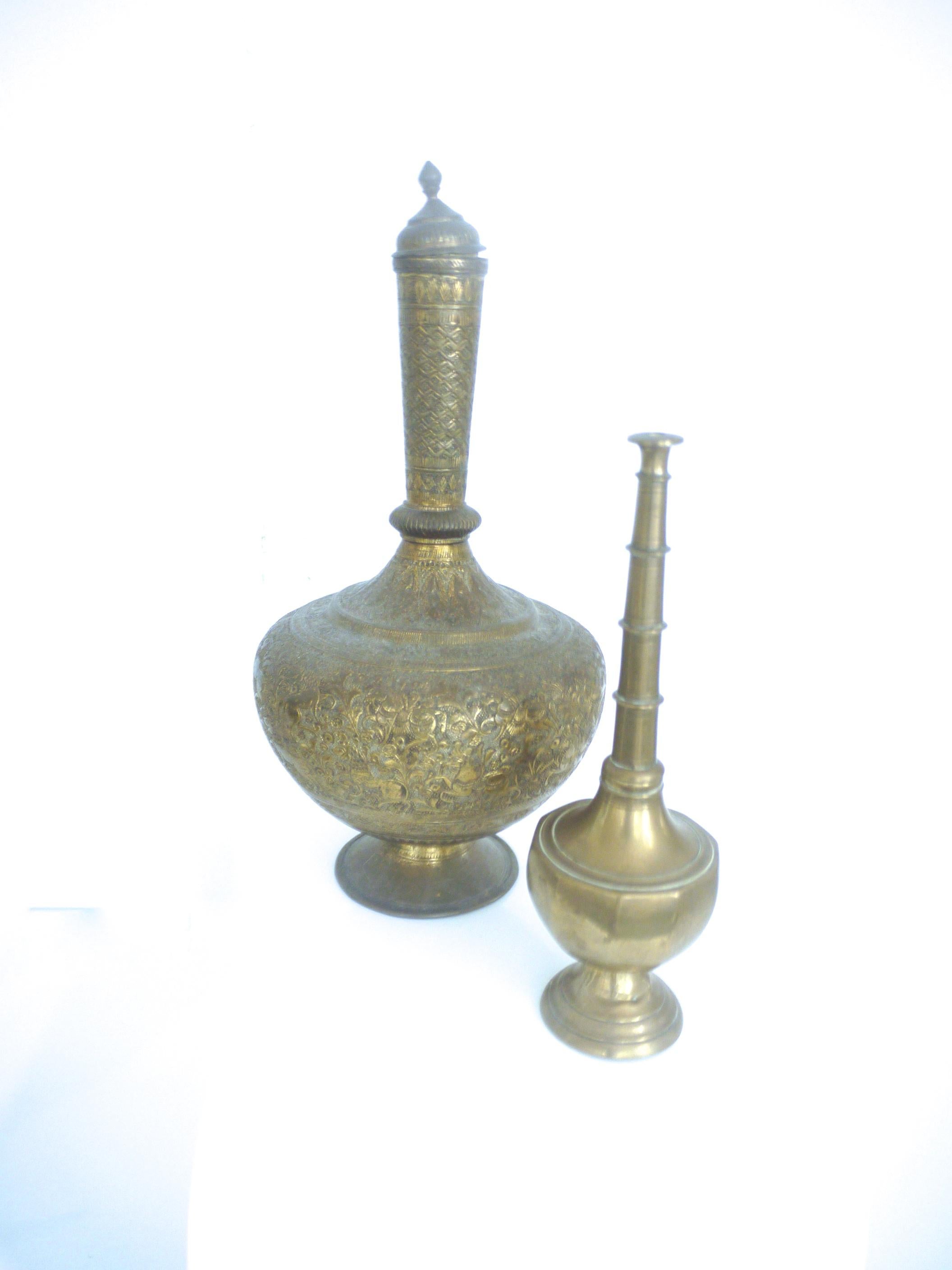 20th century Middle Eastern/North African large incense burner paired with a Rosewater Sprinkler.

We have several small collections/pairs in this genre suitable for a larger collection- offers welcome.

Large brass incense burner

Height 28