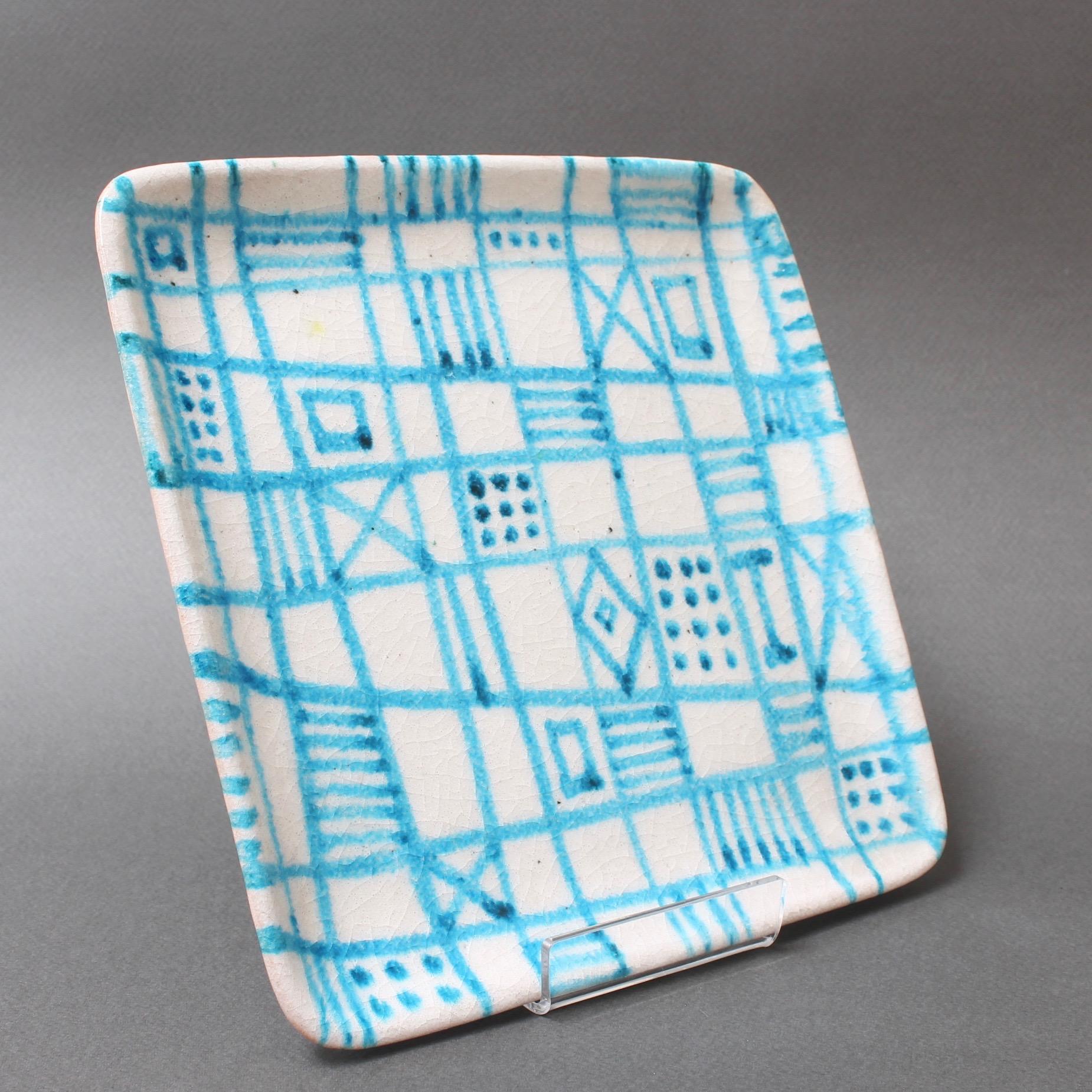 Decorative ceramic square tray / plate by Guido Gambone (circa 1950s). Hand-painted abstract decoration with geometric shapes and lines with lively powder blue over a white base. In very good vintage condition. Signed on rear: 'Gambone Italy' with