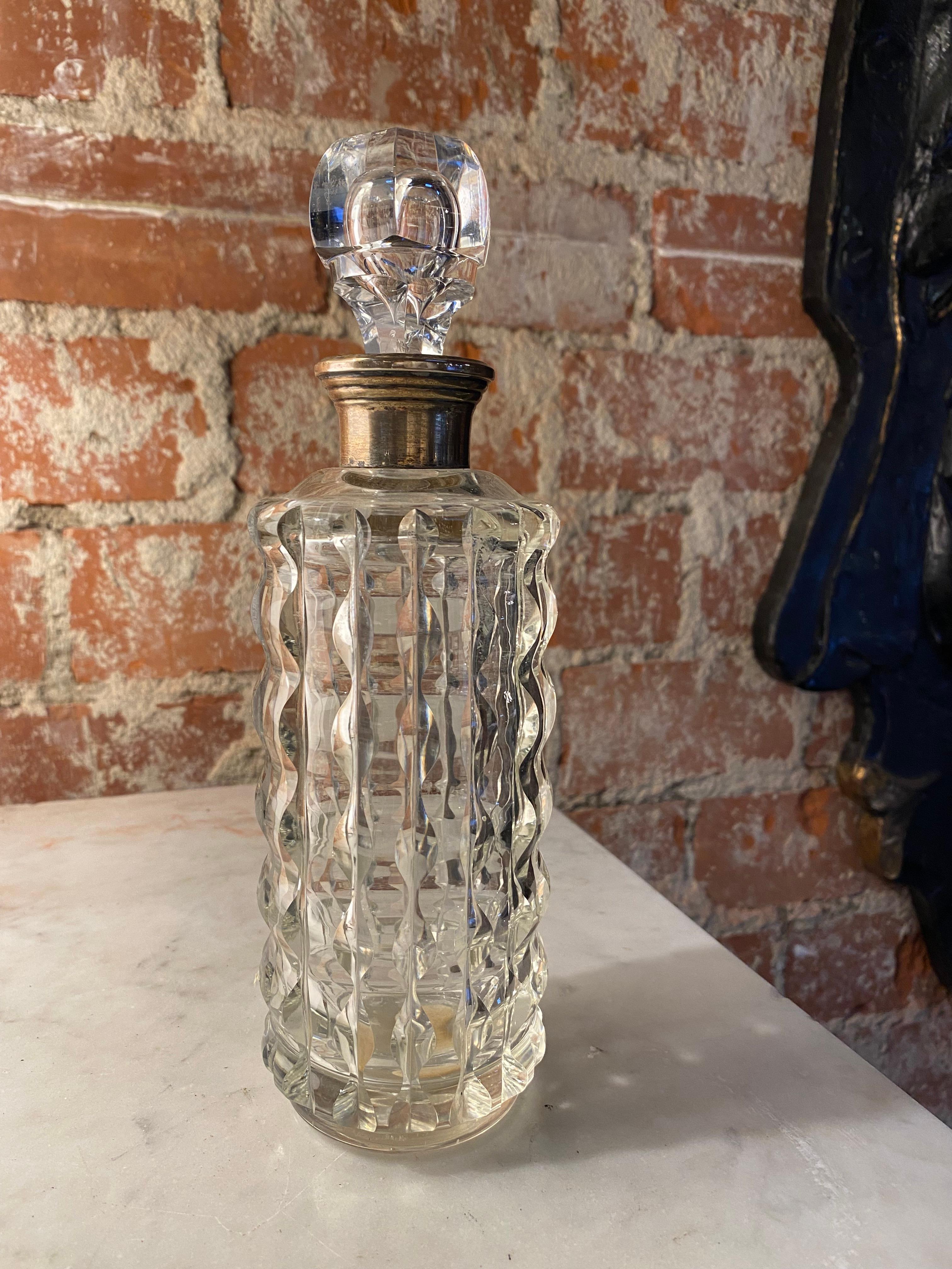 Beautiful bottle made in Italy crystal and brass 1950s.