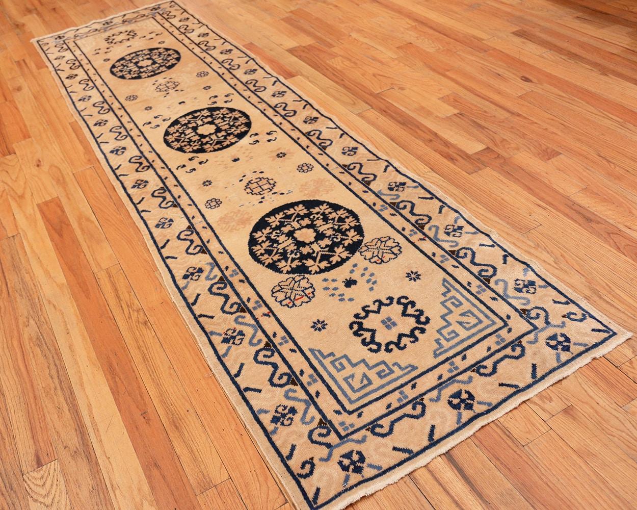 Hand-Knotted Decorative Ivory and Blue Antique Khotan Runner Rug
