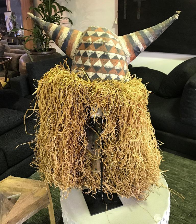 Decorative Large Adorned African Folk Art Mask with Horns on Display Stand In Good Condition In Studio City, CA