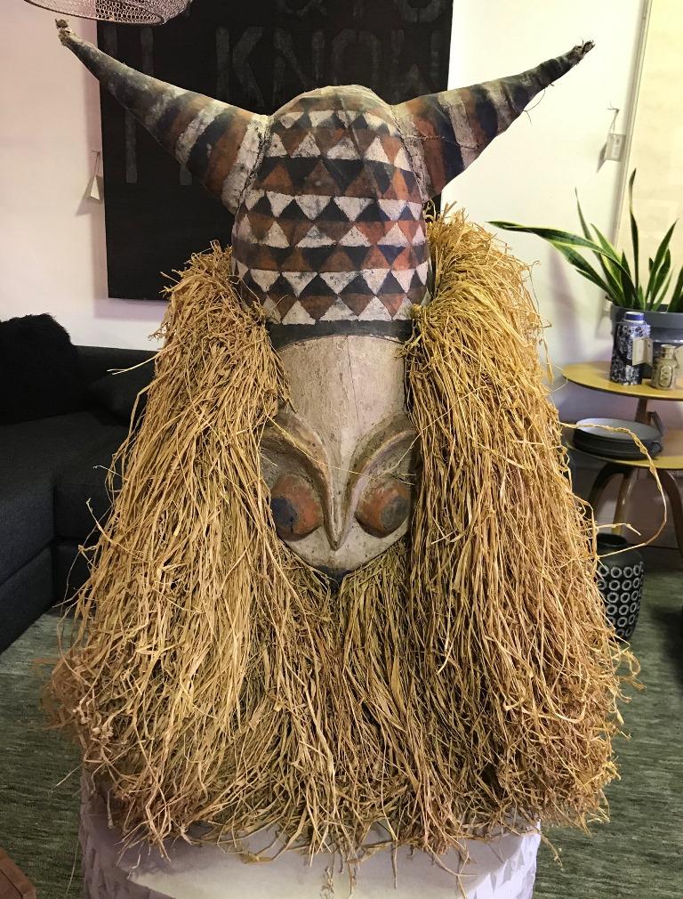Raffia Decorative Large Adorned African Folk Art Mask with Horns on Display Stand