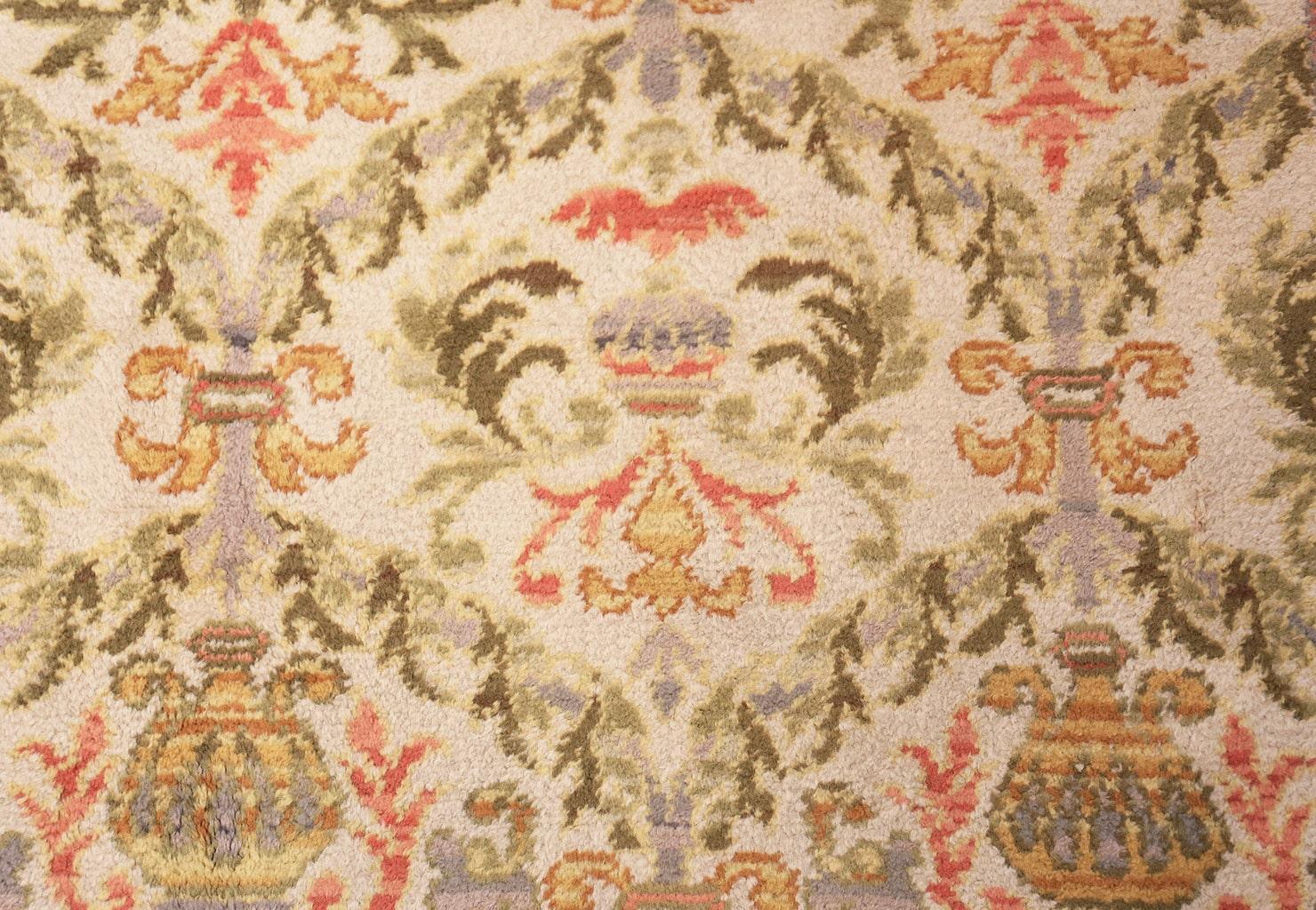 Beautiful Ivory Background Antique Spanish Rug, Country of Origin: Spain, Circa Date: 1920. Size: 9 ft 7 in x 15 ft 7 in (2.92 m x 4.75 m)

