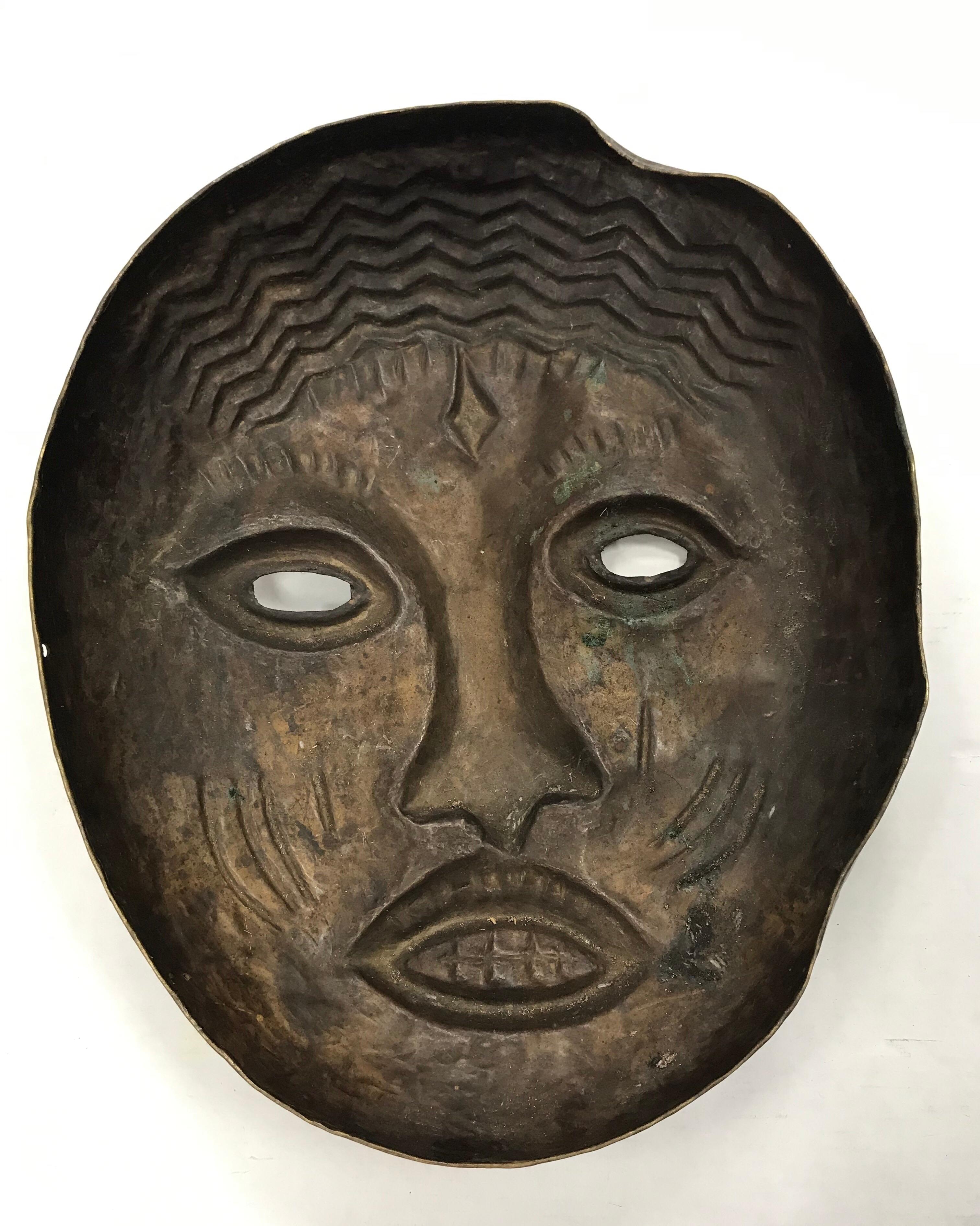 Decorative Large Metal African Tribal Hanging Mask Sculpture In Good Condition In West Hartford, CT