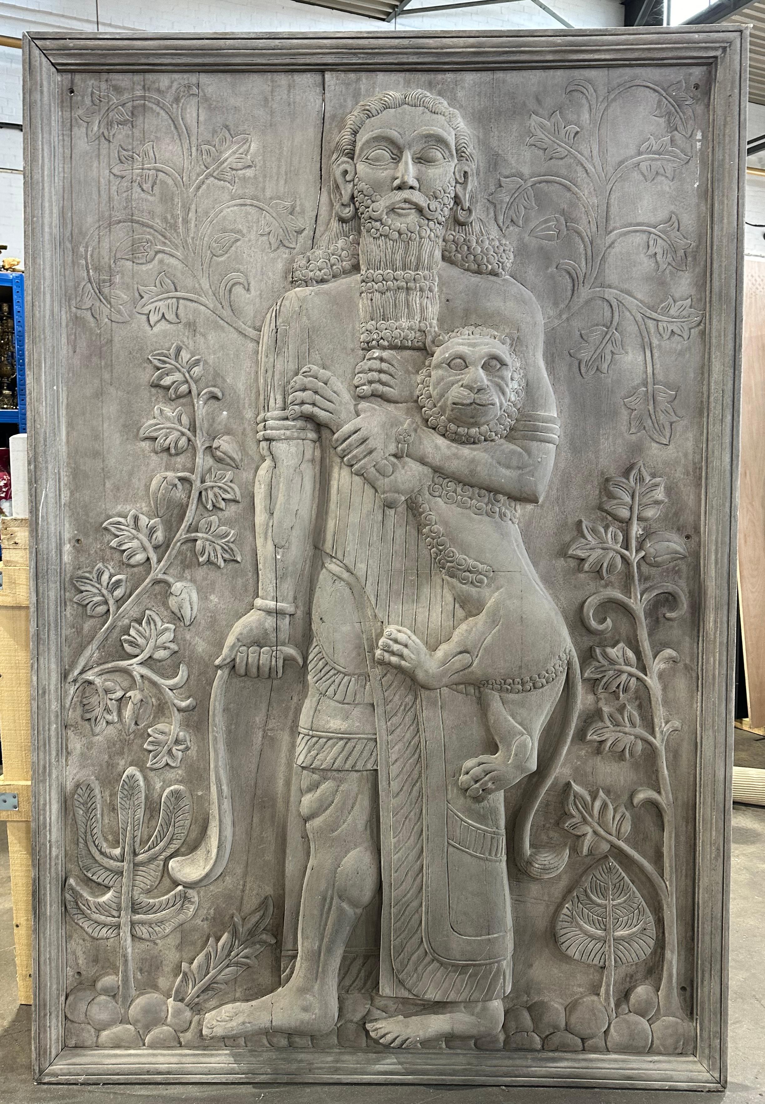 A extremely decorative large pair of carved wall panels. These panels are well carved with lots of detail, showing one male and one female figure. The carving is elaborate with depth, intricate curling foliage and minute detail such as the males