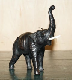 DECORATIVE LiBERTY'S LONDON OMERSA LEATHER ELEPHANT FOOTSTOOL STOOL GLASS EYES