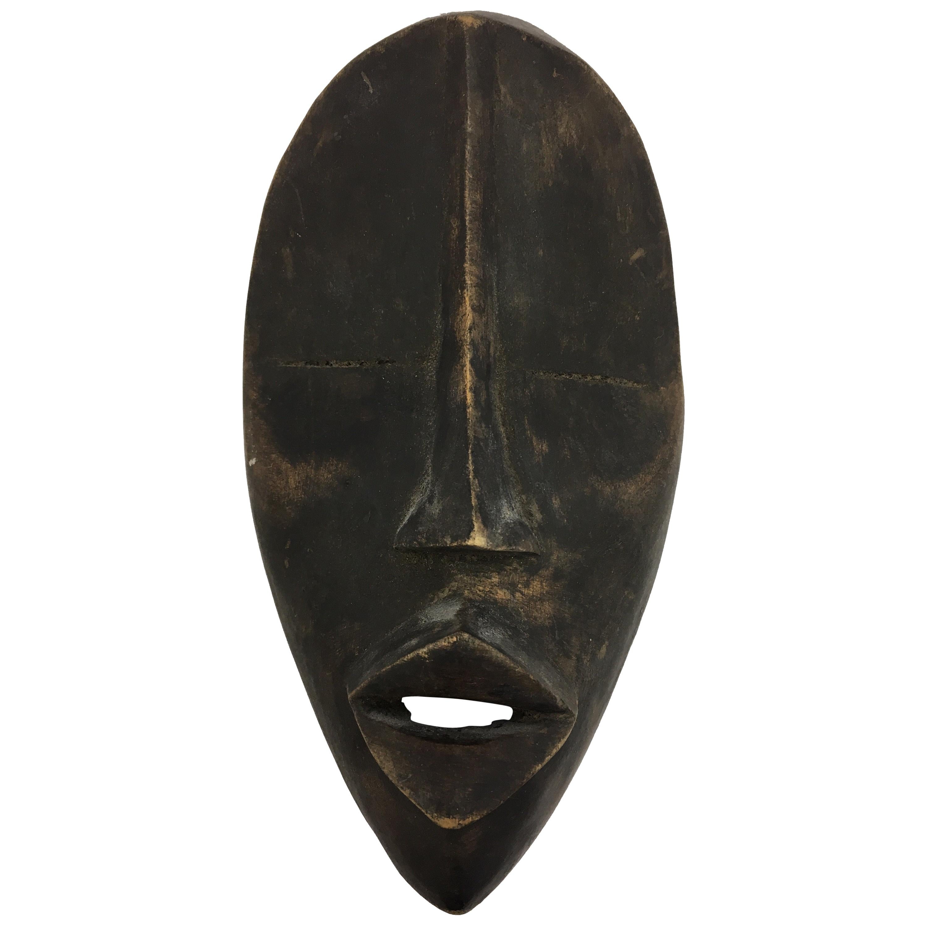 Decorative Mid-Century Modern African Folk Art Hanging Tribal Mask Sculpture