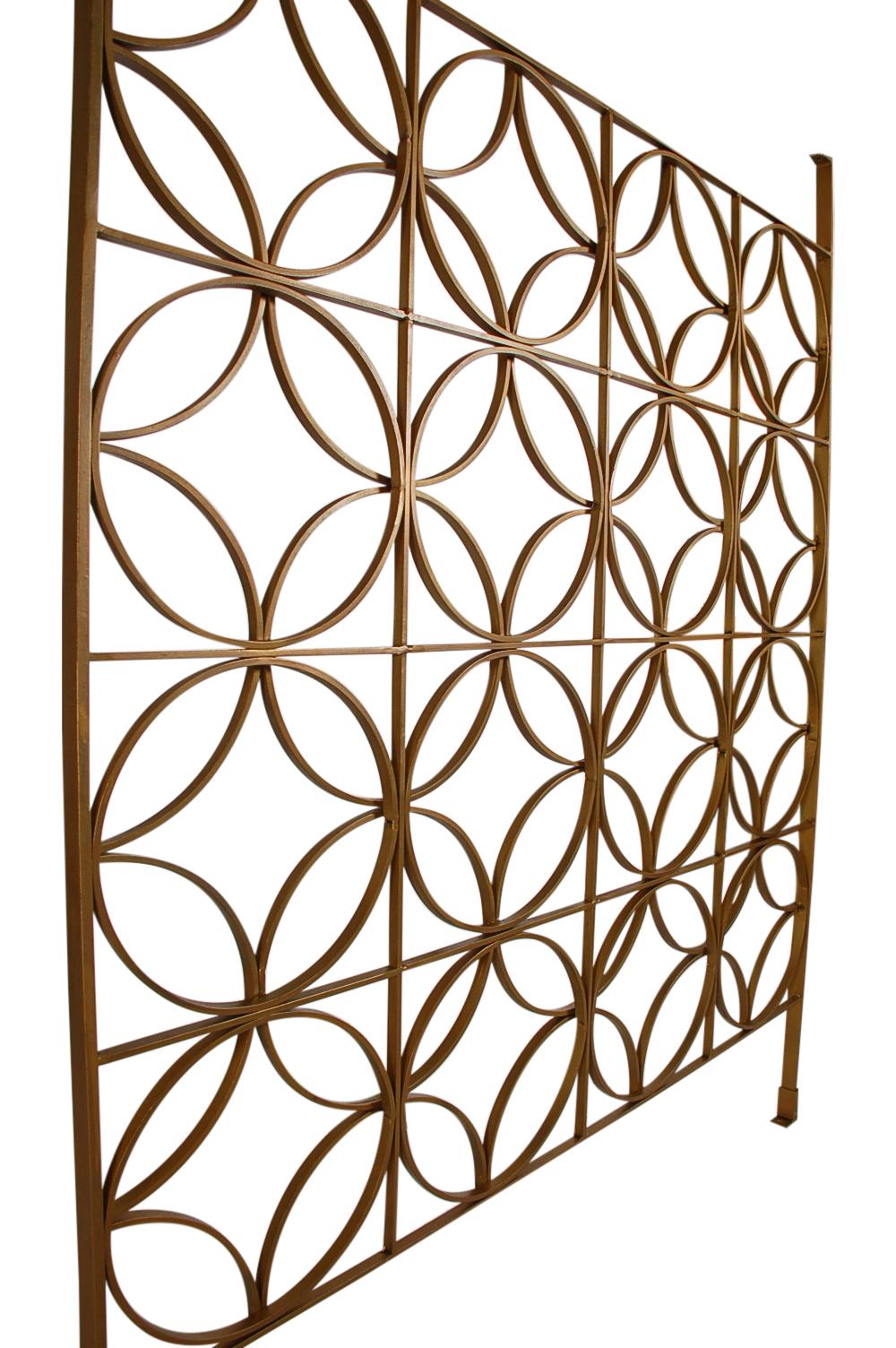 A custom welded wrought iron room divider screen from an original 1962 Mid-Century Modern home. These feature gold colored iron construction, with mounting brackets included. Priced as a set but can be sold individually. 