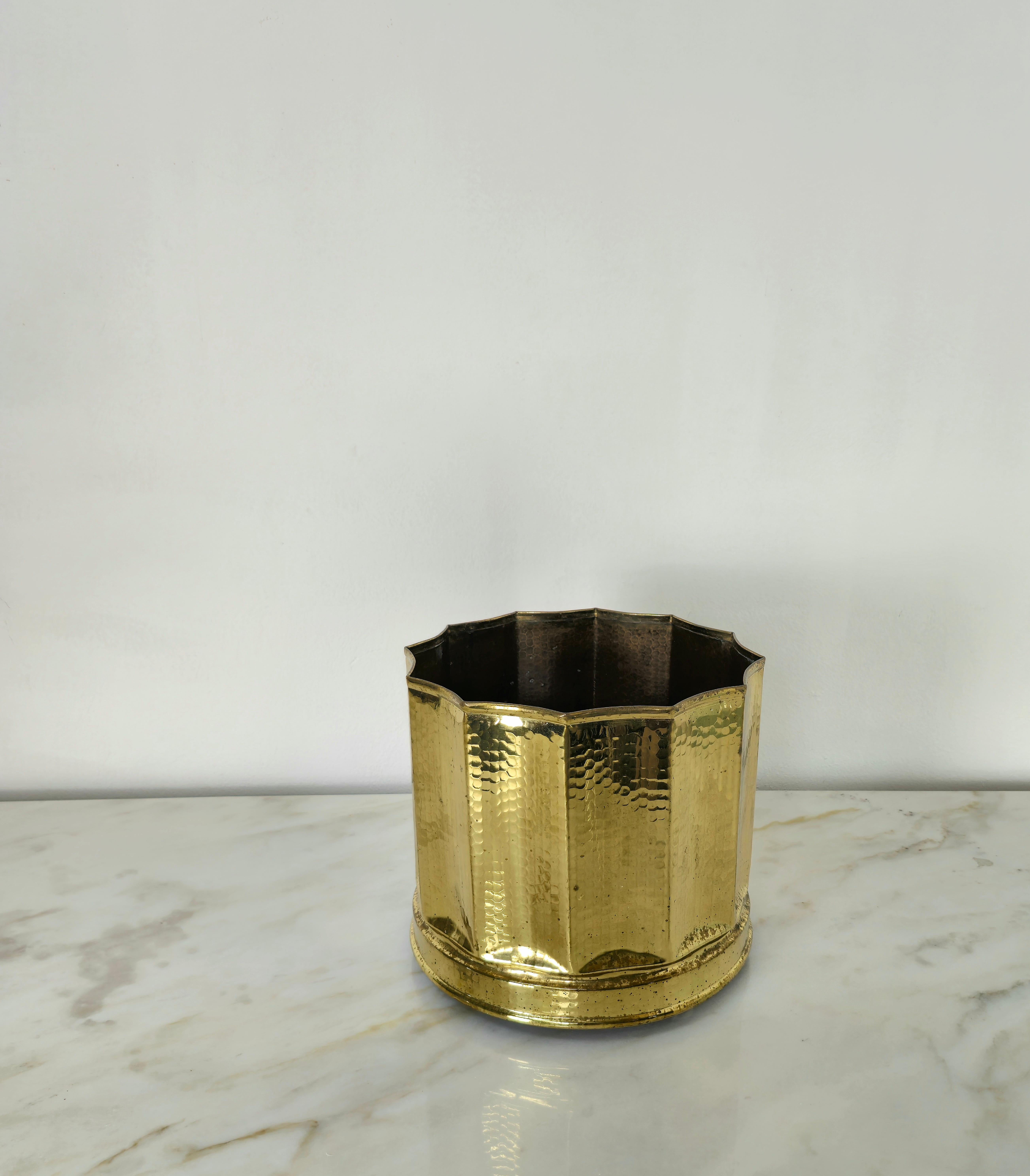 Tripod plant holder produced in Italy in the 60s.
The cylindrical plant holder with a dodecagonal border is made of hammered solid brass.



Note: We try to offer our customers an excellent service even in shipments all over the world, collaborating