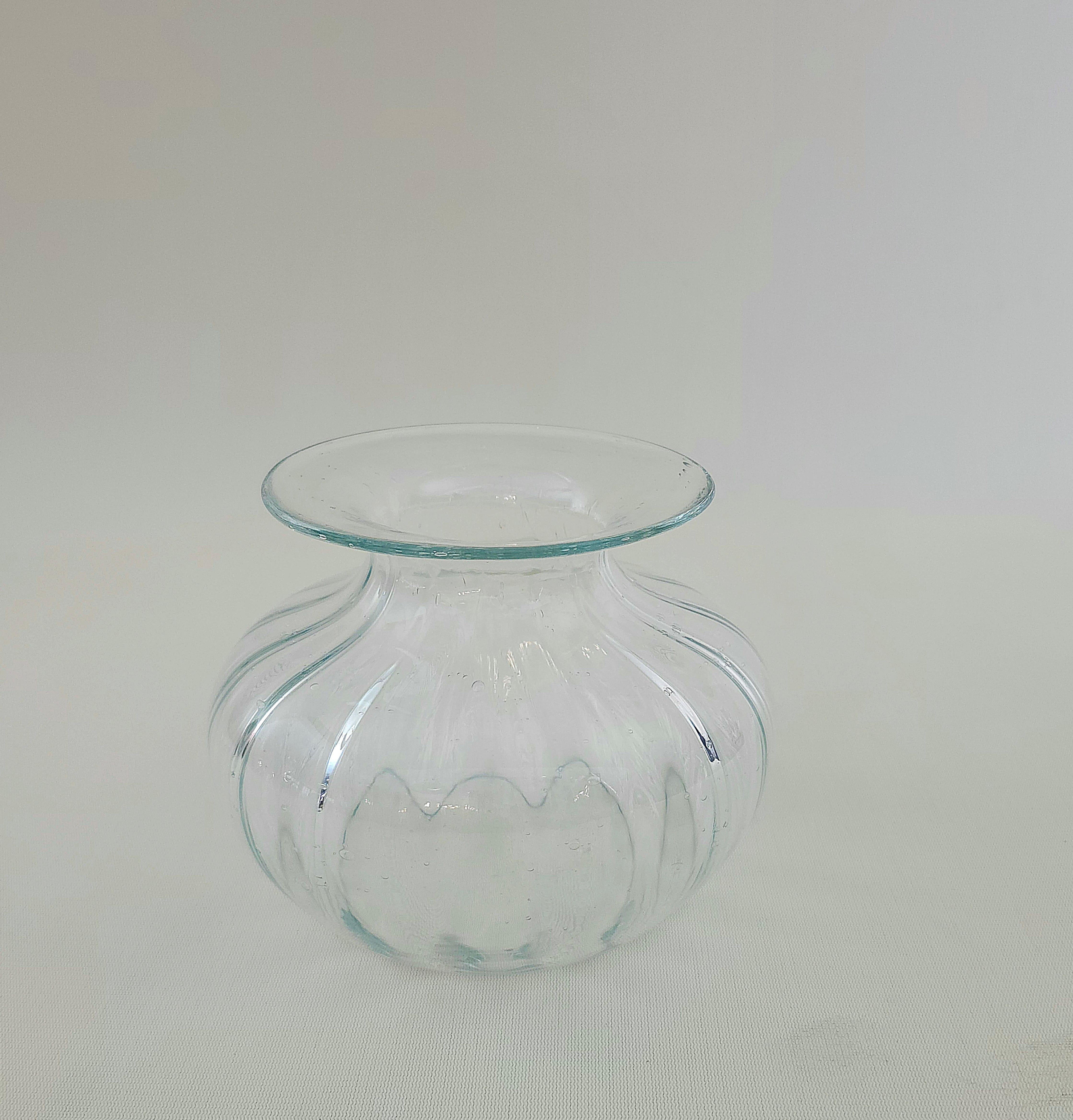 Murano glass vase with ribbed relief, narrow neck and wide mouth. Handmade, attributed to Barovier&Toso, Italy 1940s/50s.


Note: We try to offer our customers an excellent service even in shipments all over the world, collaborating with one of the