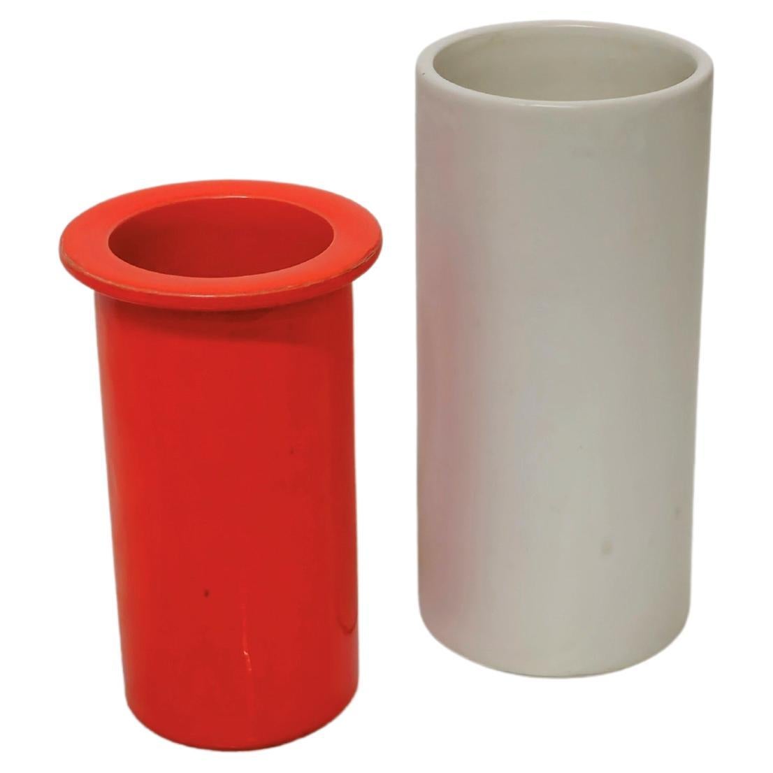 Off-white vase and flower holder by Sicart in cylindrical orange glazed ceramic. They can also be used as decorative objects. Produced in the 70s.



Note: We try to offer our customers an excellent service even in shipments all over the world,