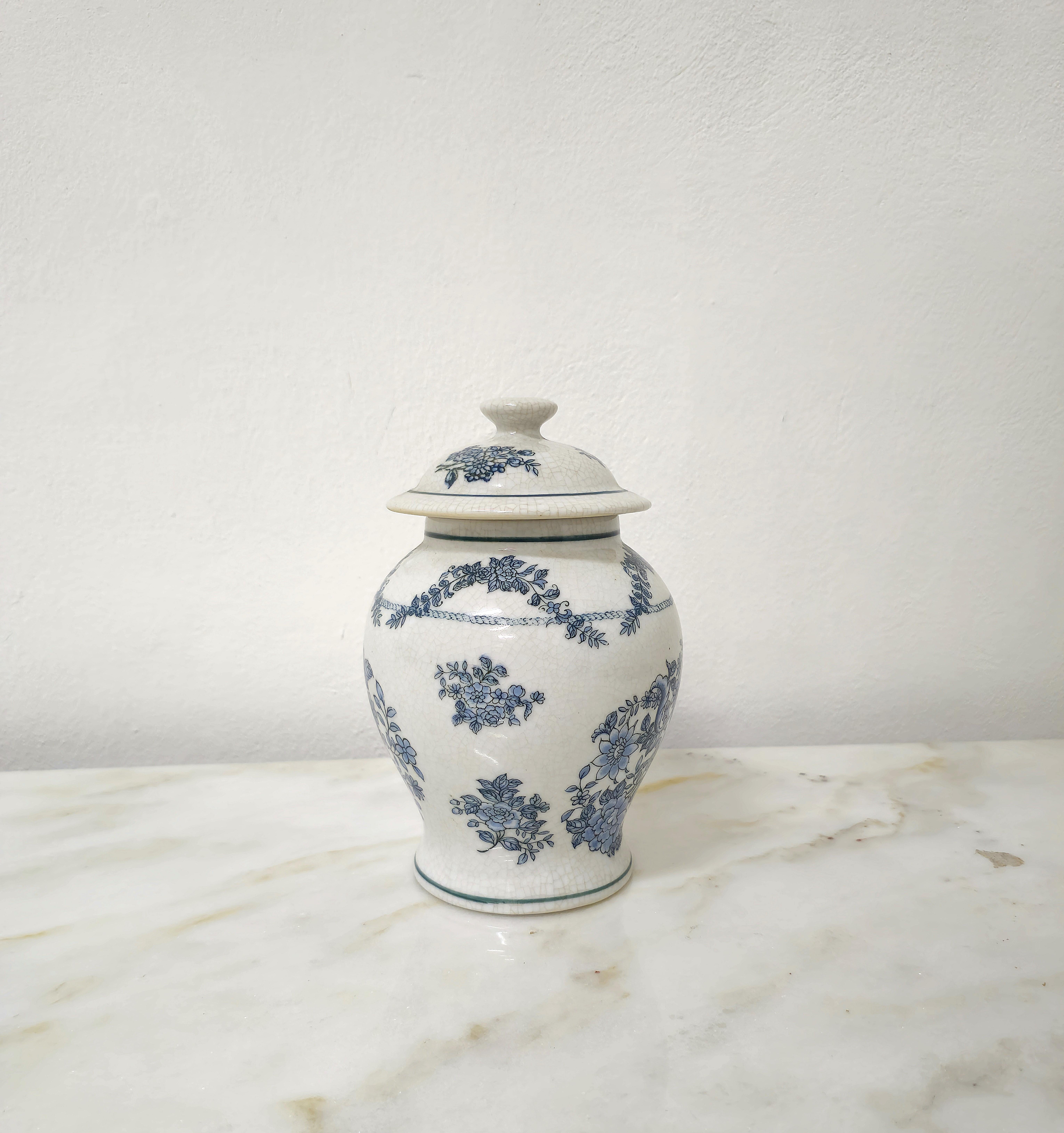 Vase with lid produced in Italy in the 1960s.
The vase was made of porcelain in shades of white, with hand-painted floral decorations in shades of lavender.



Note: We try to offer our customers an excellent service even in shipments all over the