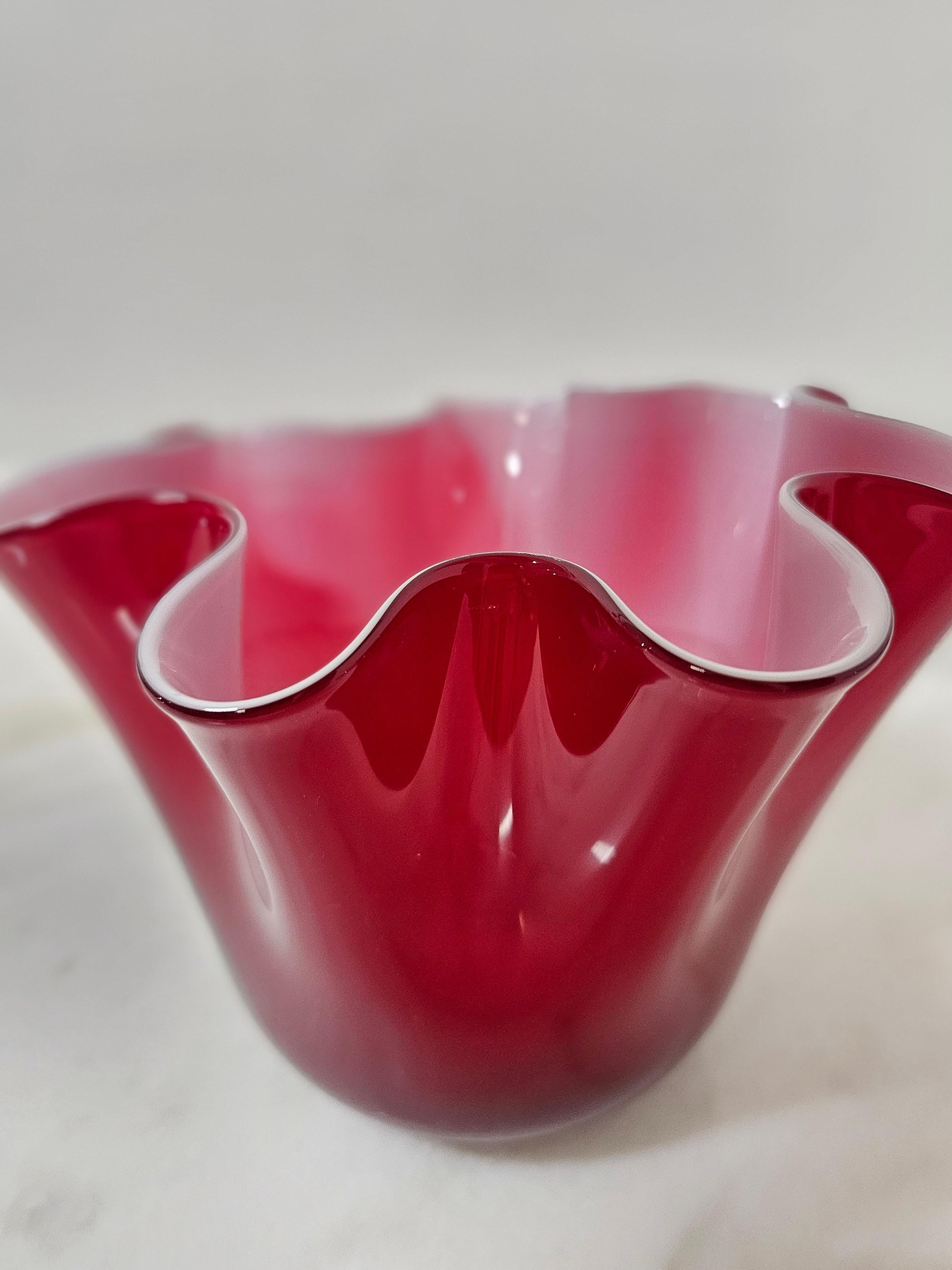 Handkerchief vase made of red layered Murano glass. Made in Italy in the 80s.


Note: We try to offer our customers an excellent service even in shipments all over the world, collaborating with one of the best shipping partners, DHL, with very fast