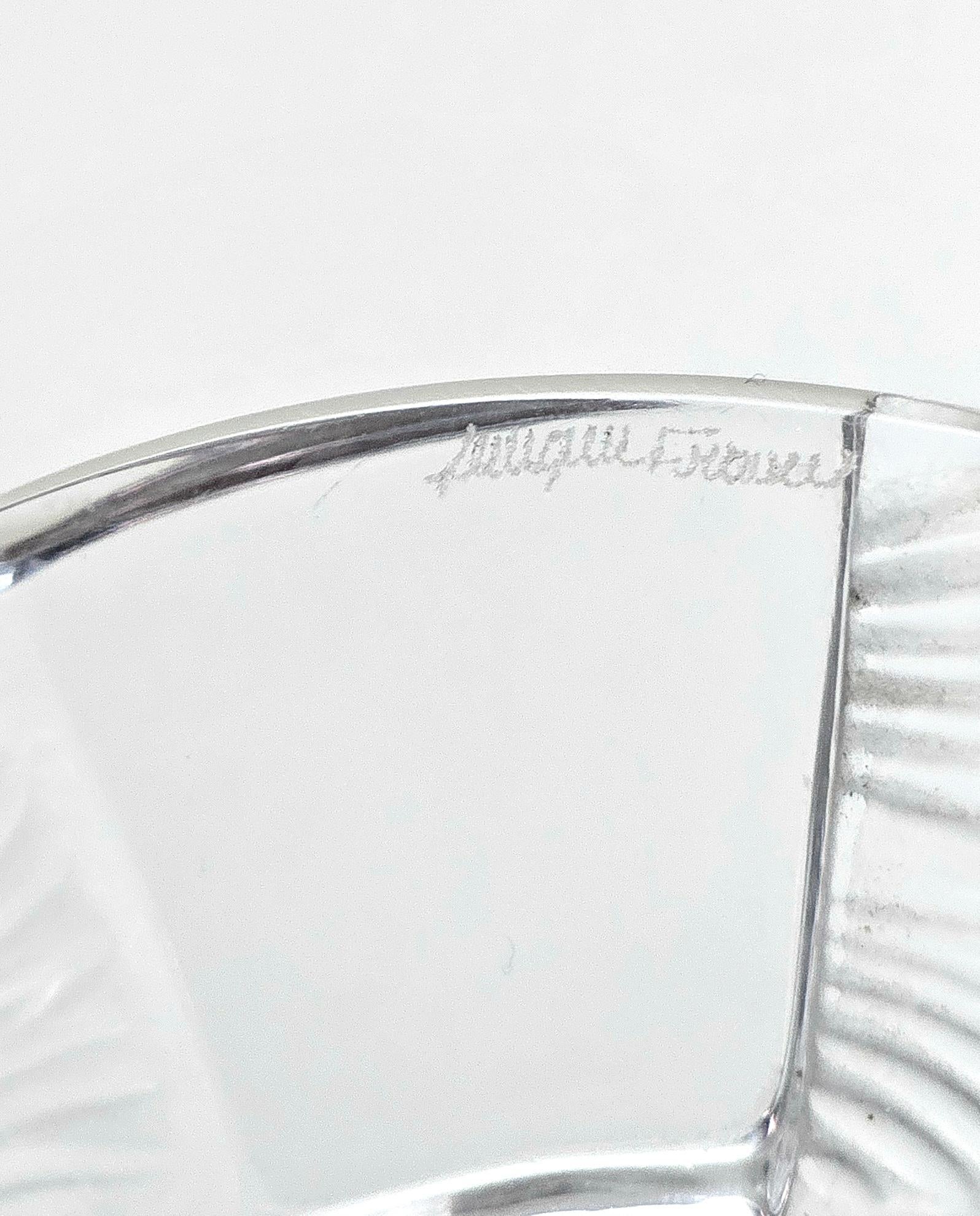 Circular vide-poche made of hand-sculpted and hand-crafted Lalique Paris crystal glass.
Signature below. France in the 60s.


Note: We try to offer our customers an excellent service even in shipments all over the world, collaborating with one of