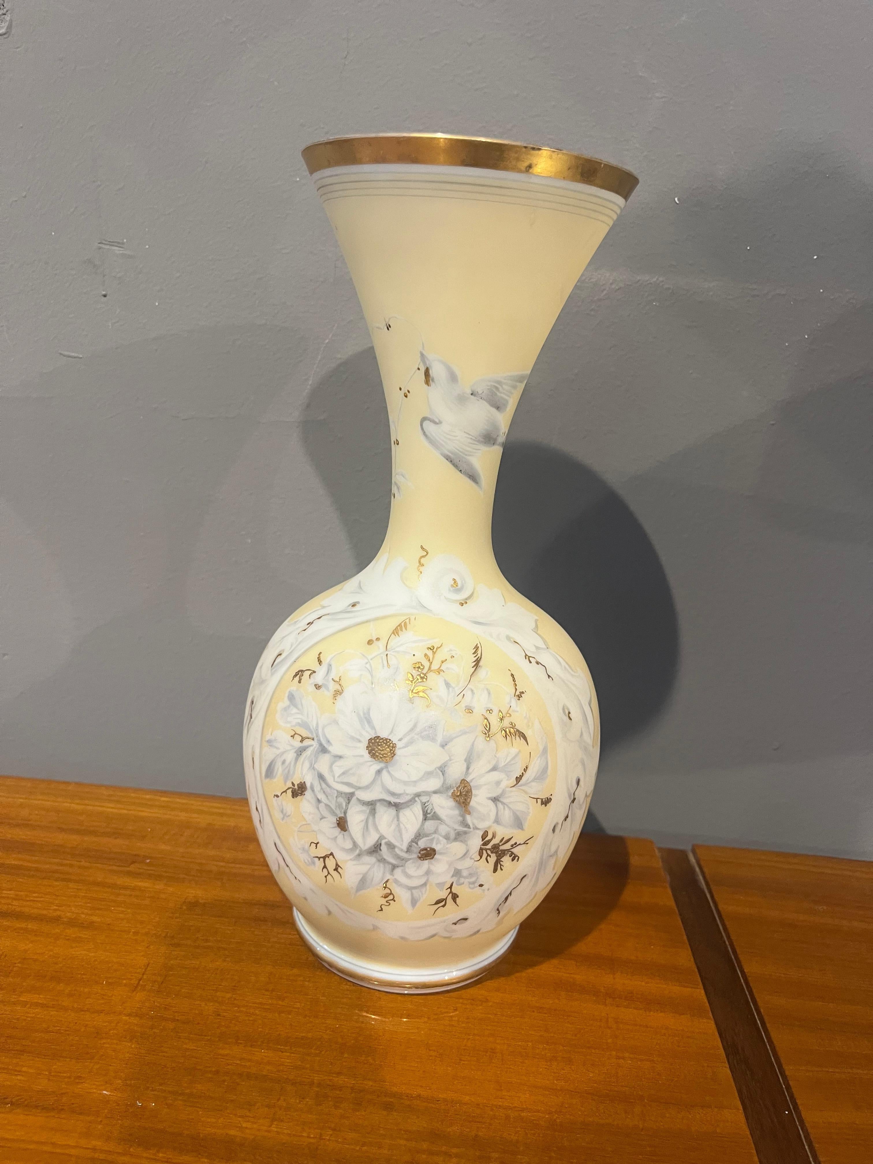 There’s a quiet glow in this vase, a softness that seems to hold time still.
Made in the late 1800s, this opaline glass vase is more than a decorative object — it is a vessel of light, memory, and refined taste.
Crafted in the era of Victorian