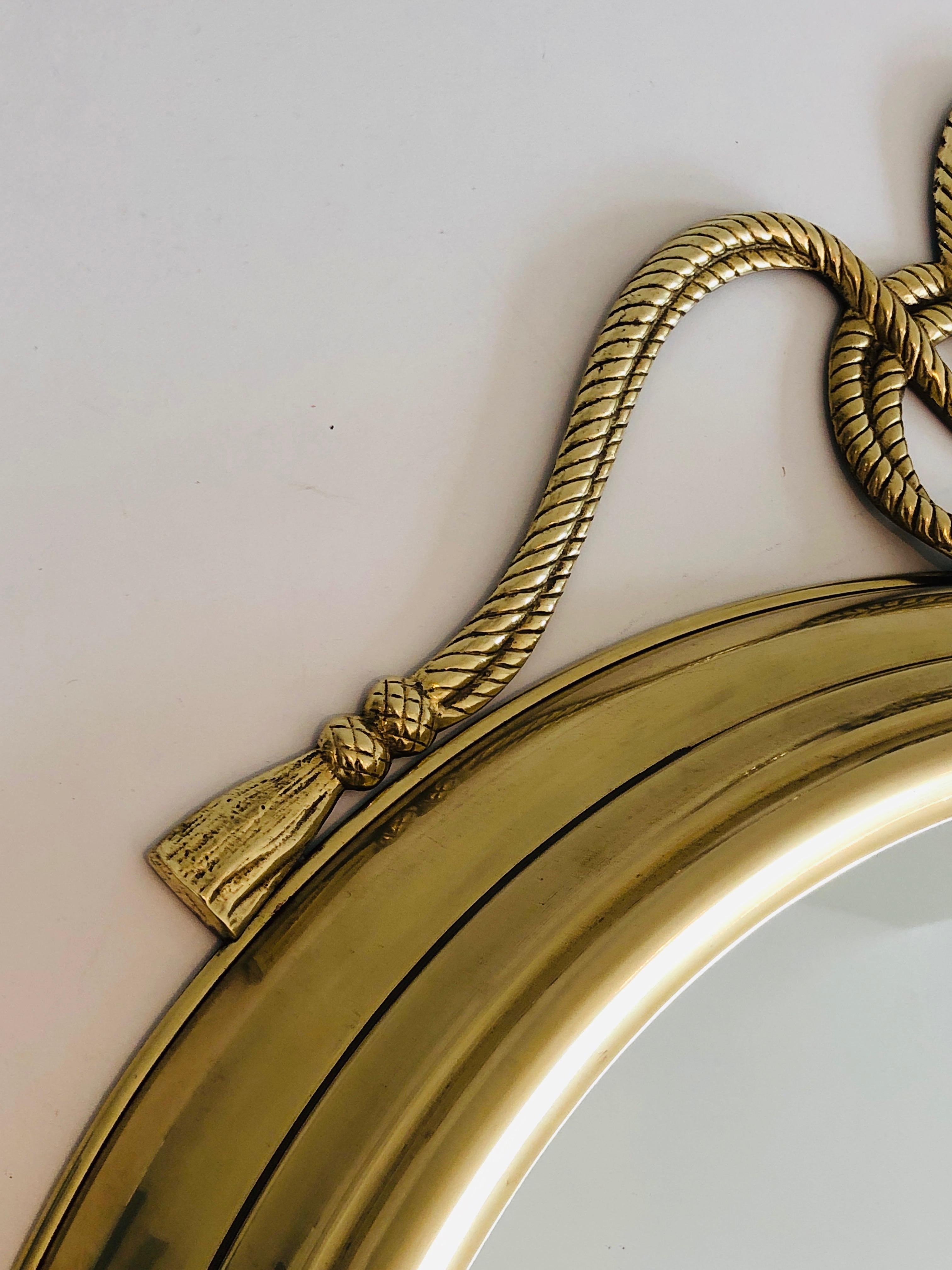 Specchio decorativo ovale in ottone con grandi noduli sulla parte superiore in vendita 5