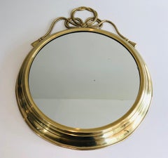 Decorative Oval Brass Mirror with Large Noddles on Top