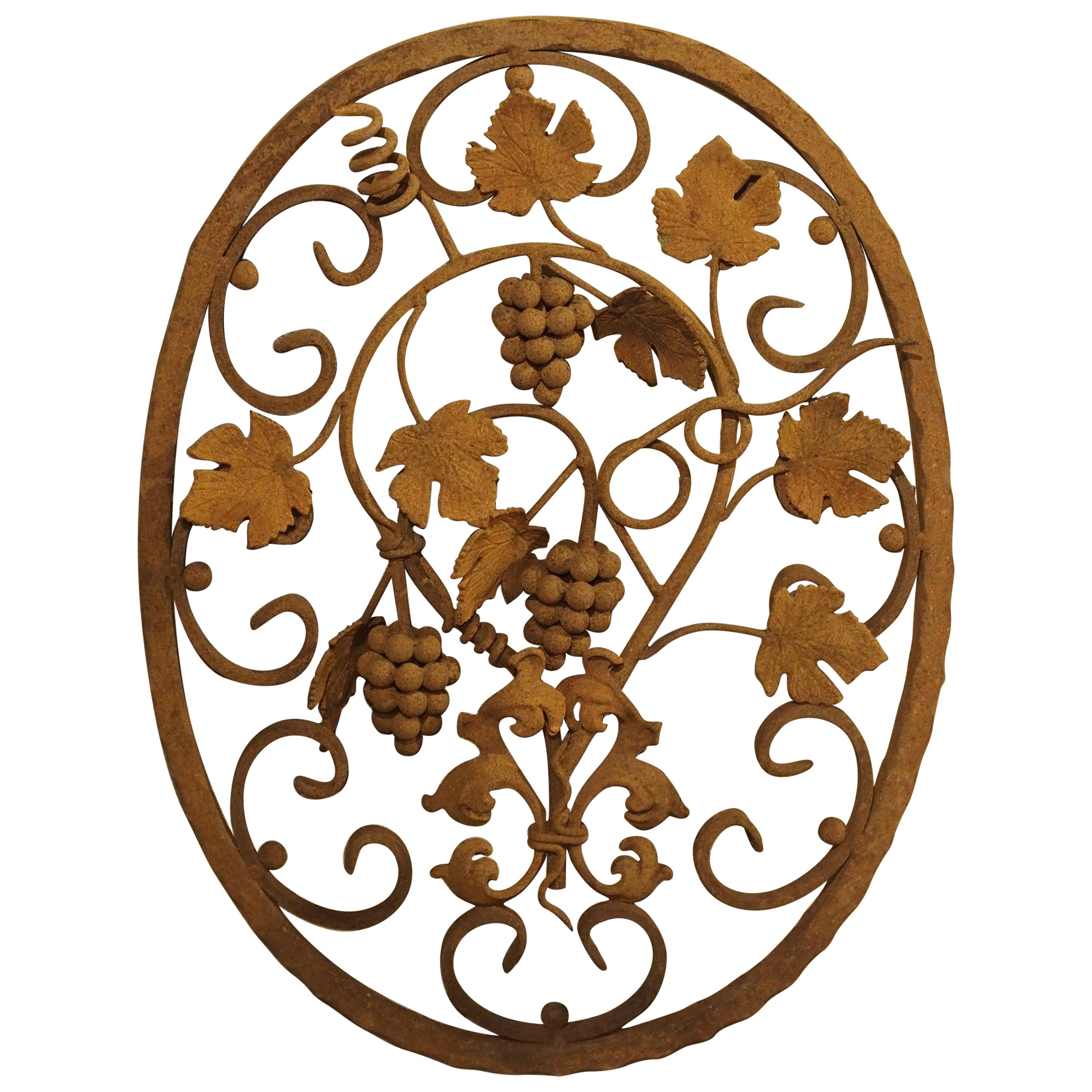 Decorative Oval Iron Wall Hanging with Scrolling Grape Vines at 1stDibs