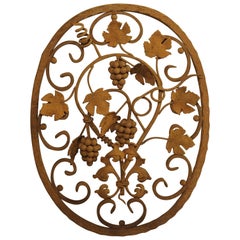 Decorative Oval Iron Wall Hanging with Scrolling Grape Vines