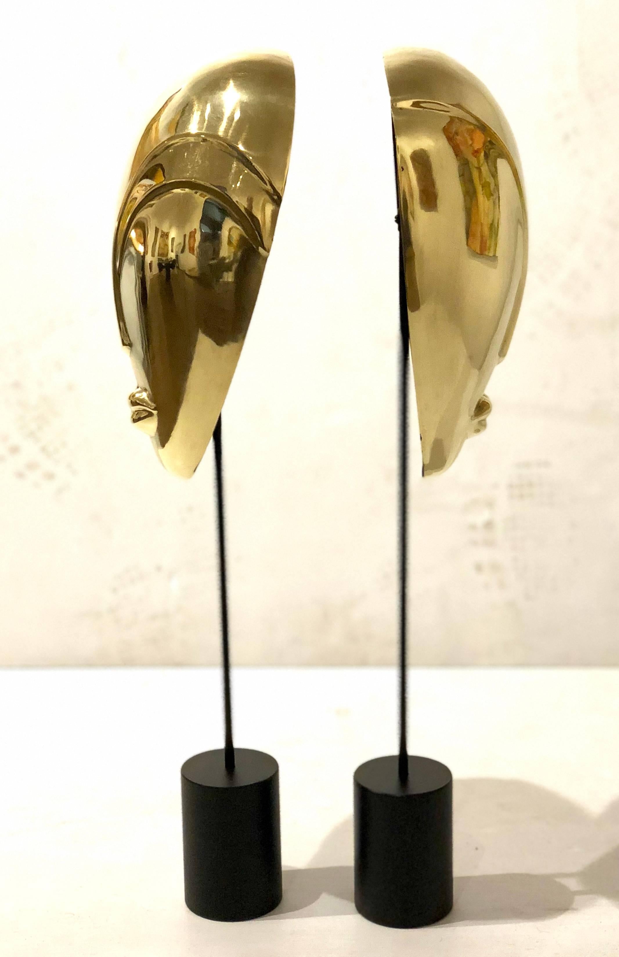 Hong Kong Decorative Pair of Brass Masks Sculptures Alien Faces Art Deco on Stands