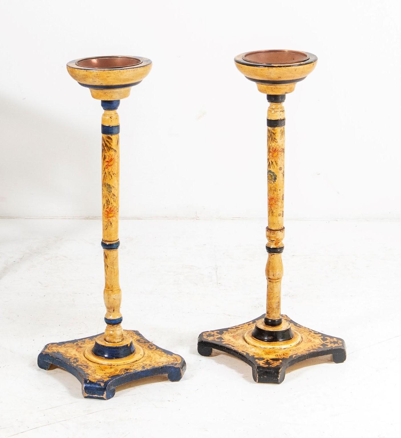 An unusual, rare pair of hand painted floor standing ashtrays, probably Asian, mid/late 19th Century. Highly decorative with hand painted floral decoration on Gesso.
Not an exact pair, one dark blue and the other in black with slight variation in