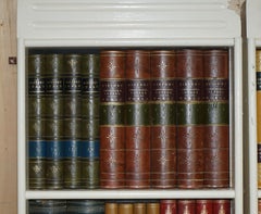 DECORATIVE PAiR OF HAND MADE IN ENGLAND LEATHER BOUND BOOK LIBRARY STUDY DOORS