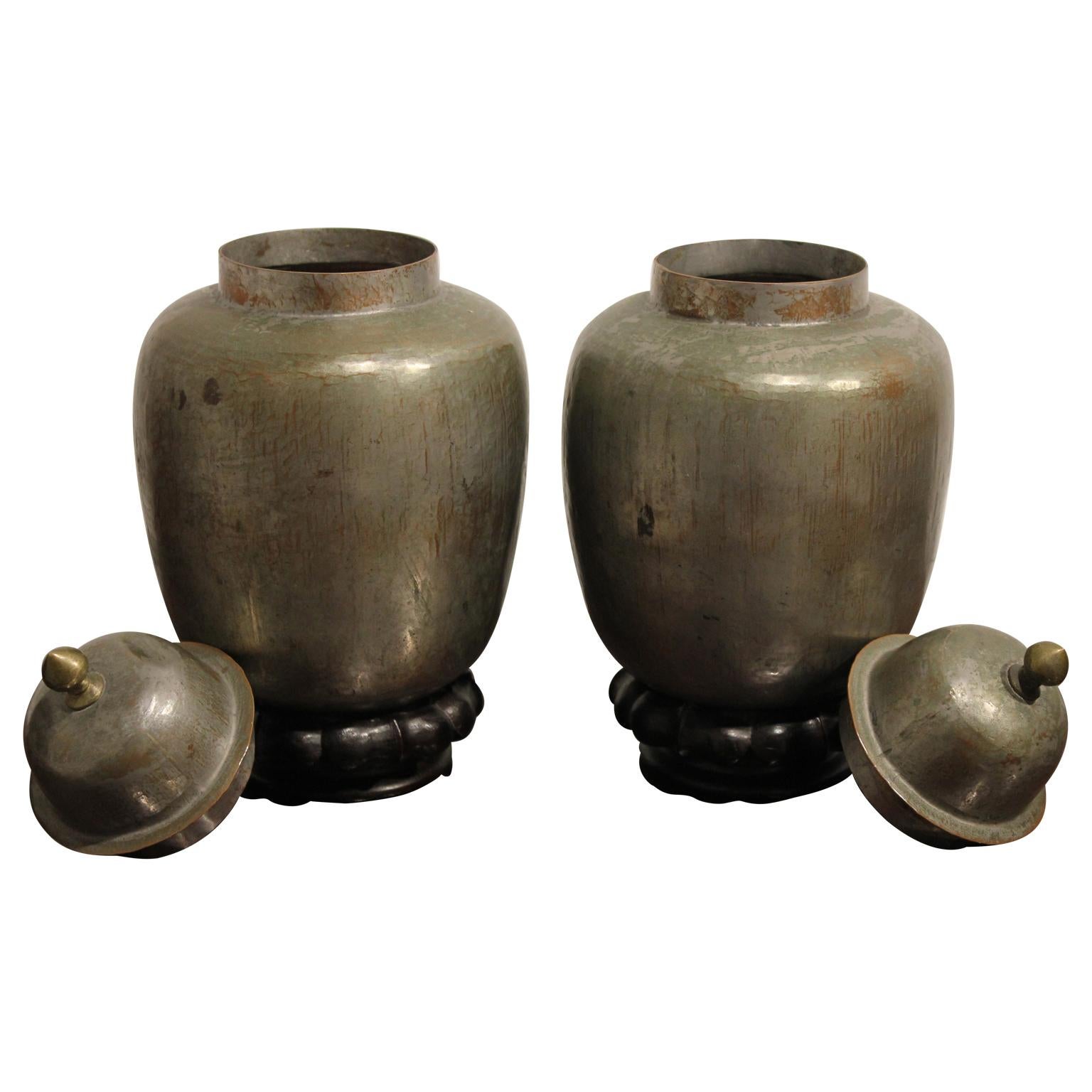 Decorative Pair of Metal Vessels with a Wooden Pedestal