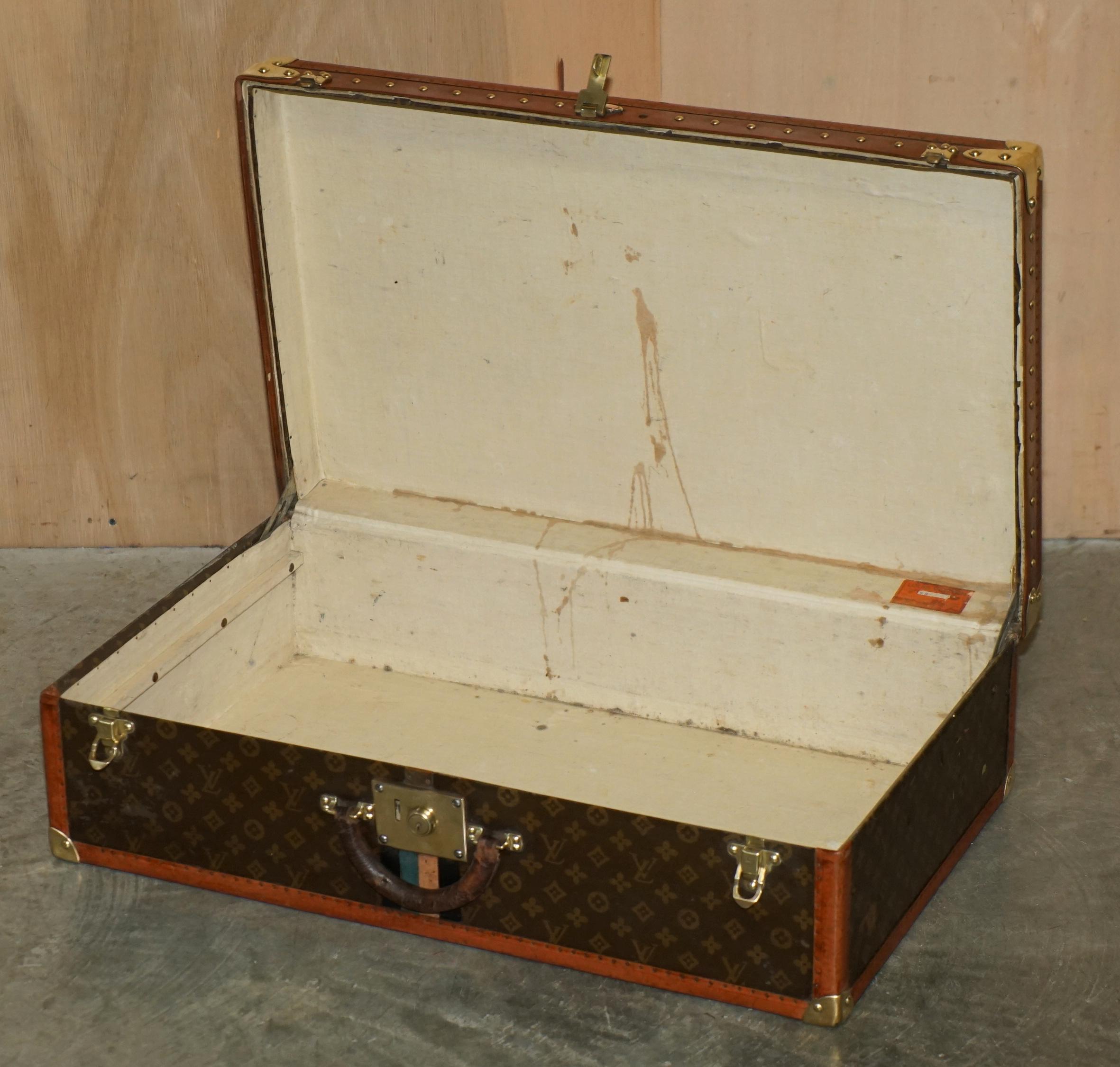 DECORATIVE PAIR OF RESTORED ANTiQUE LOUIS VUITTON MONOGRAM SUITCASE TRUNKS For Sale 6