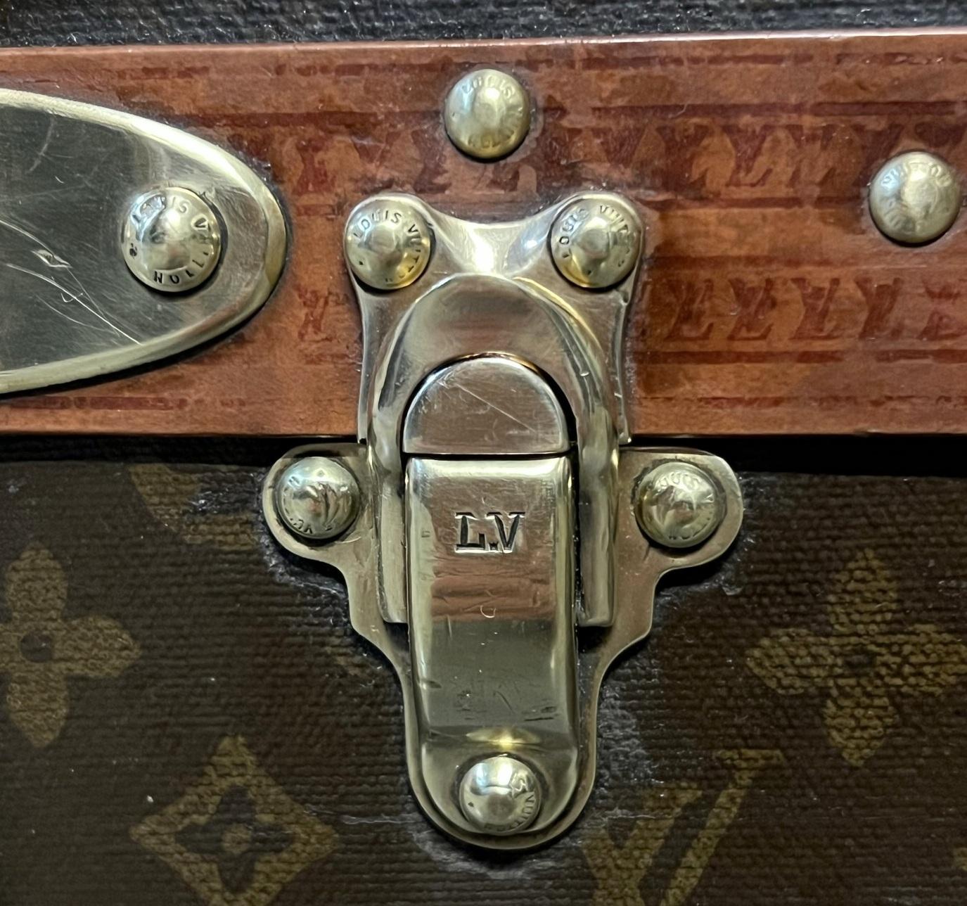 Hand-Crafted DECORATIVE PAIR OF RESTORED ANTiQUE LOUIS VUITTON MONOGRAM SUITCASE TRUNKS For Sale