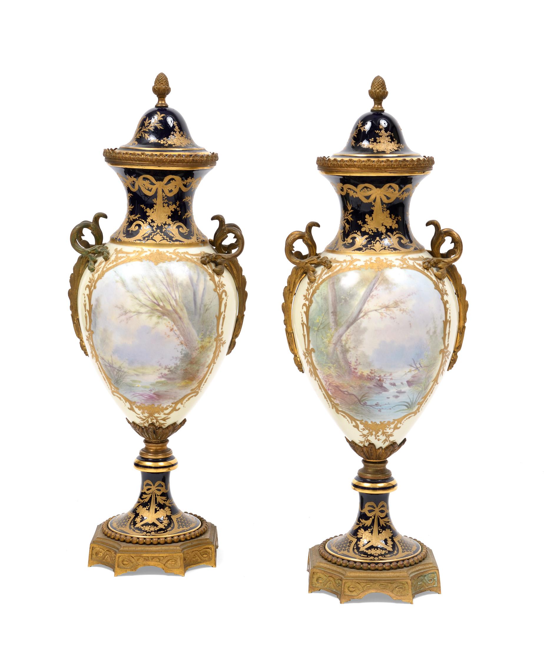 Pair of vases cobalt blue sevres porcelain with ormolu bronze, on 
each cover top bear a mark 