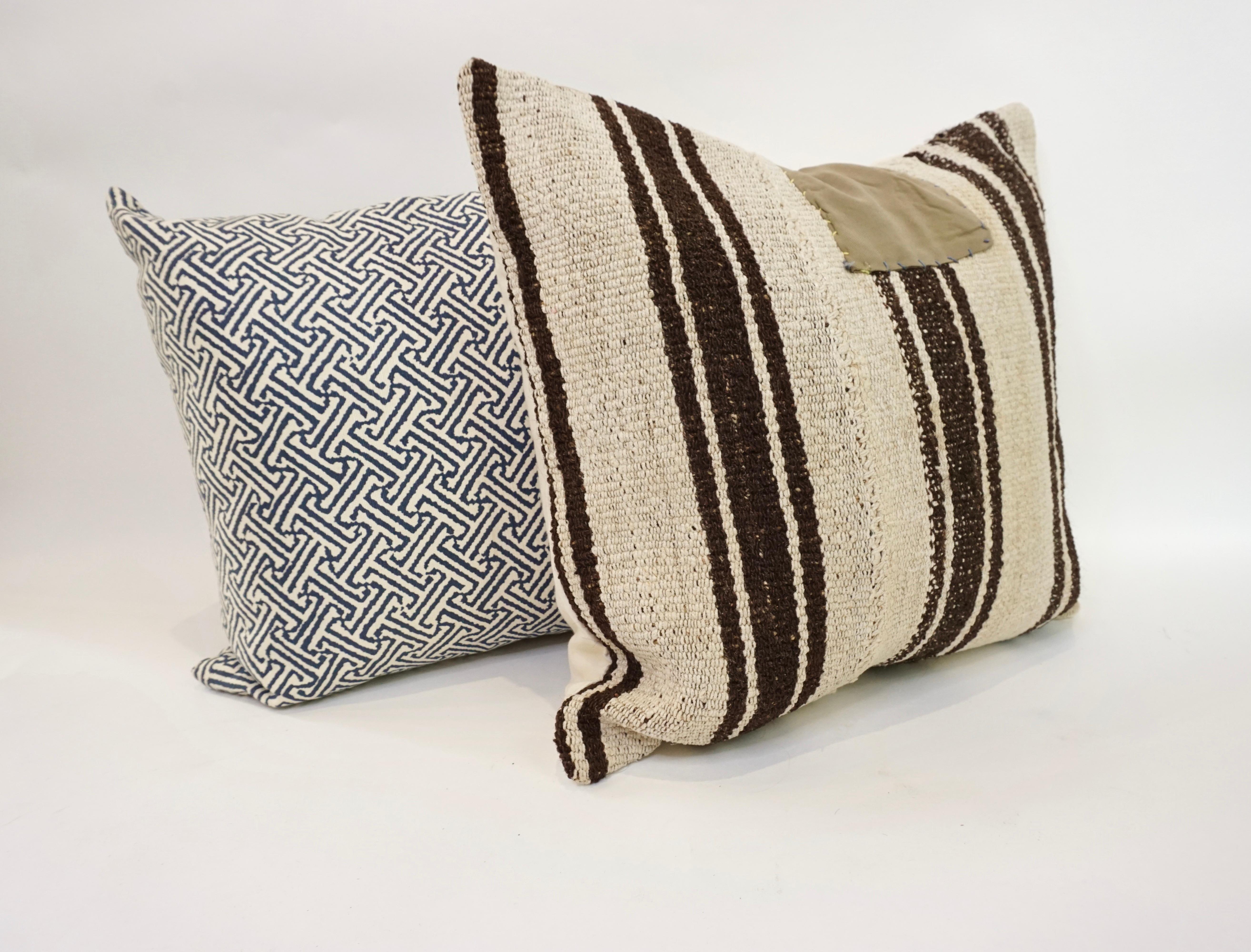 A beautiful and plush accent for your home, this pillow is covered in an antique textile and has a cozy down insert. Measure: 18 x 18.