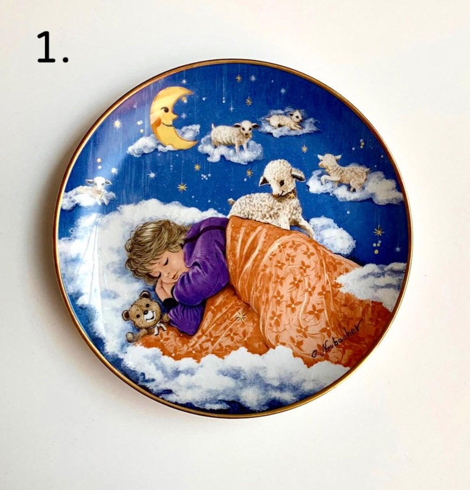 Decorative collection plates from the finest bone china from the famous German manufactory Kaiser (Kaiser). 

Series “Classical lullabies of the world.” 

Plates were created by German artist Gerda Neubacher and released in 1985-1986. 

There