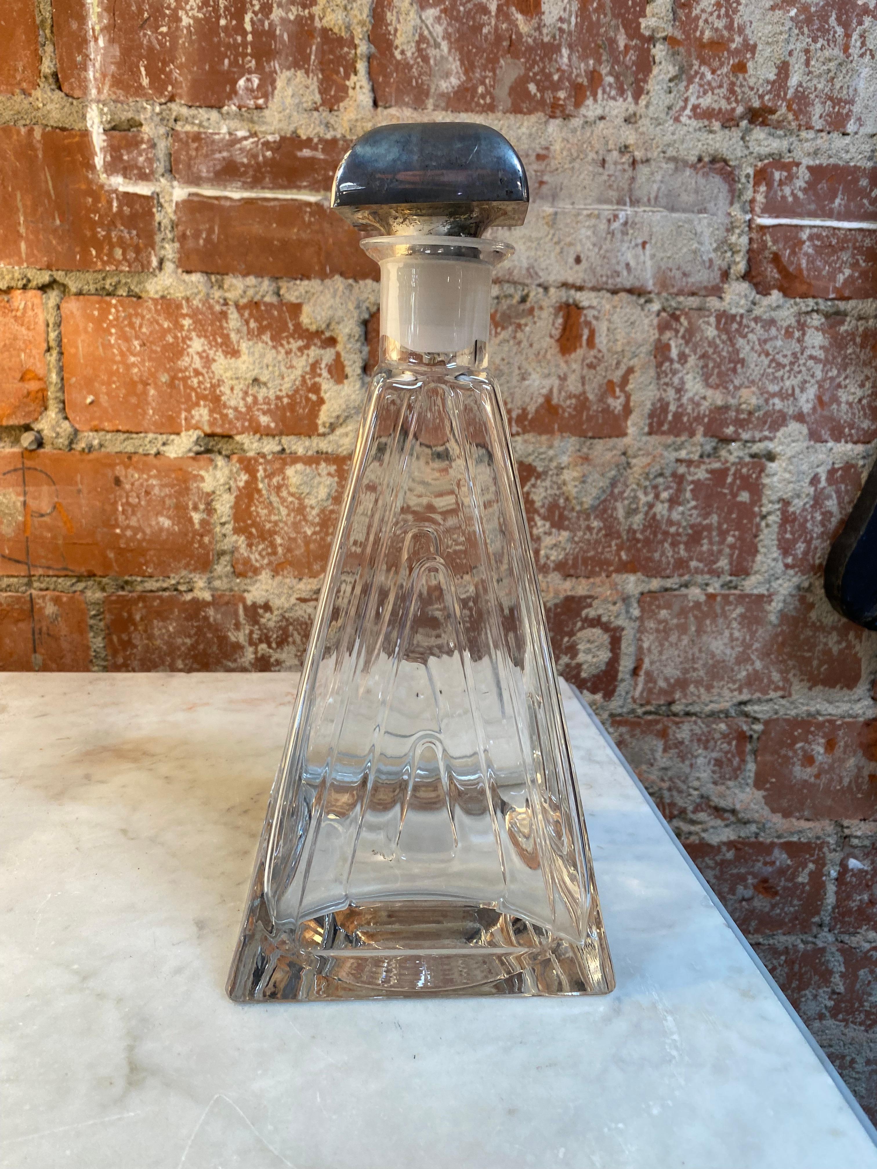 Beautiful Pyramid Italian bottle made with crystal and silver details.
