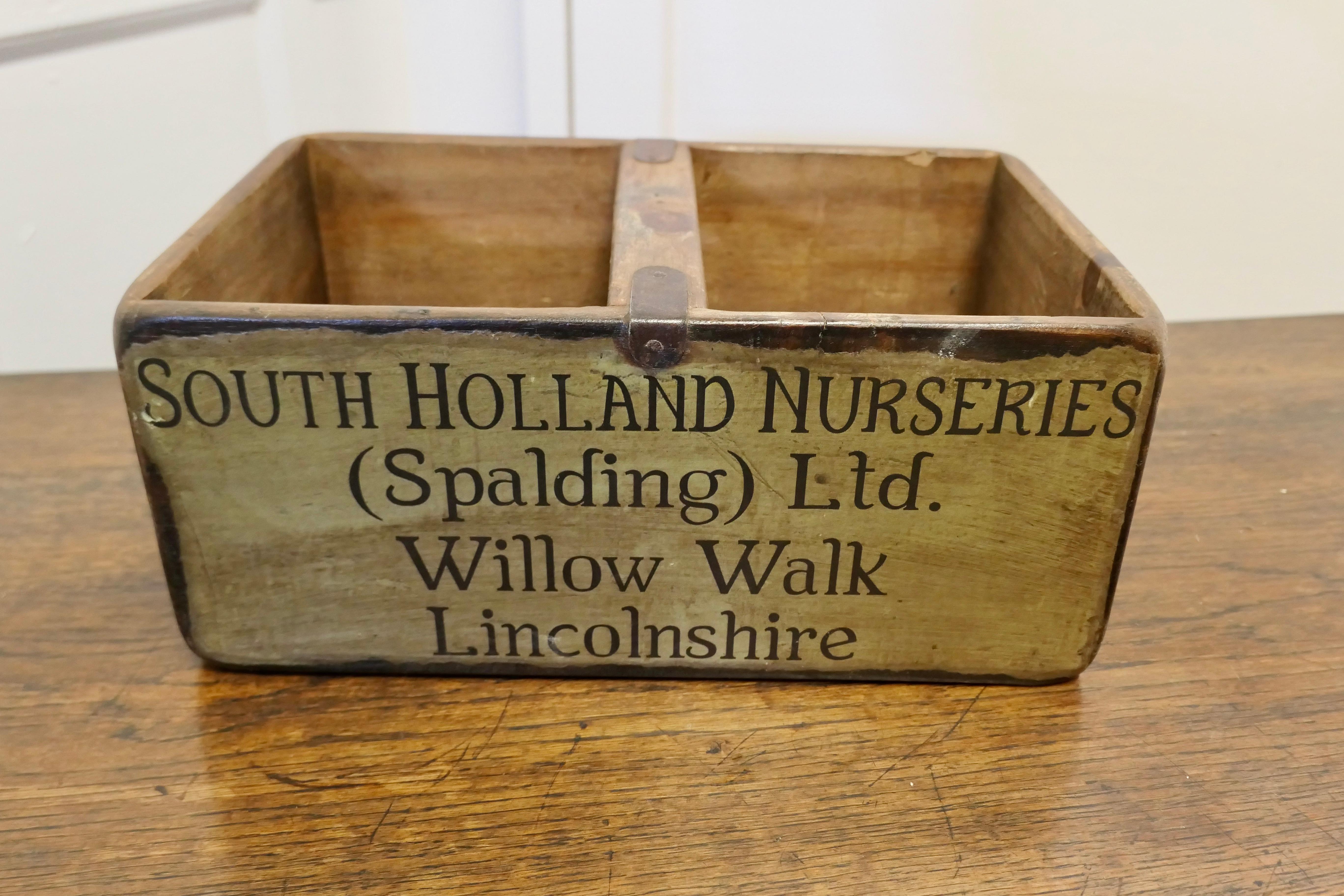 Decorative Re Painted 19th Century Wine Box, Trug

A delightful piece painted over, advertising South Holland Nurseries 
The Carrier is made in pine and painted in Olive green and divided in 2
A great piece of attractive kitchenalia 
The Box is 6”