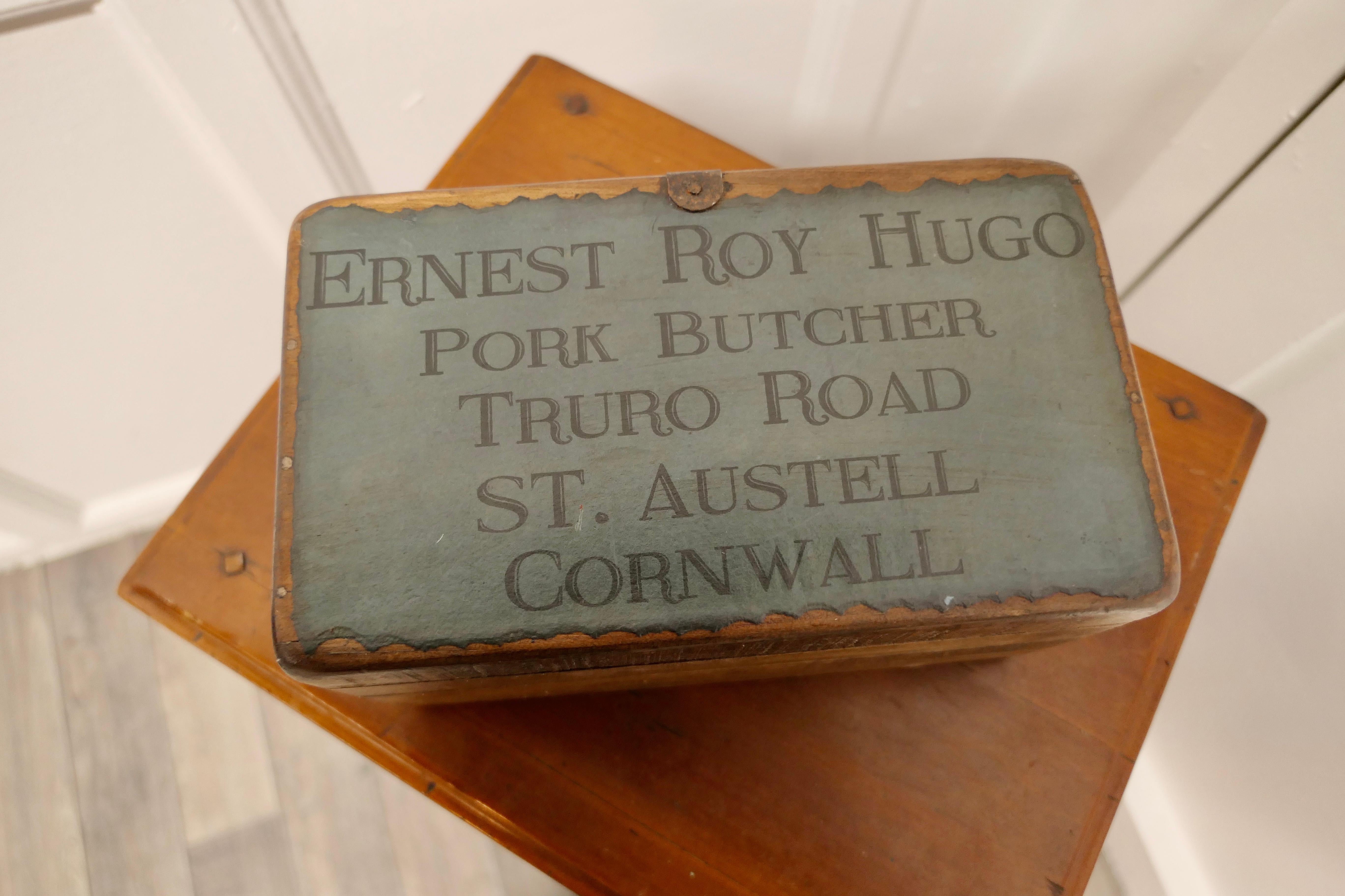 Decorative re painted 19th century wine box, trug.

A delightful piece painted over, advertising Roy Hugo Butcher.
The Carrier is made in pine and painted in a Dark Blue/Green and divided in 2
A great piece of attractive kitchenalia 
The Box is