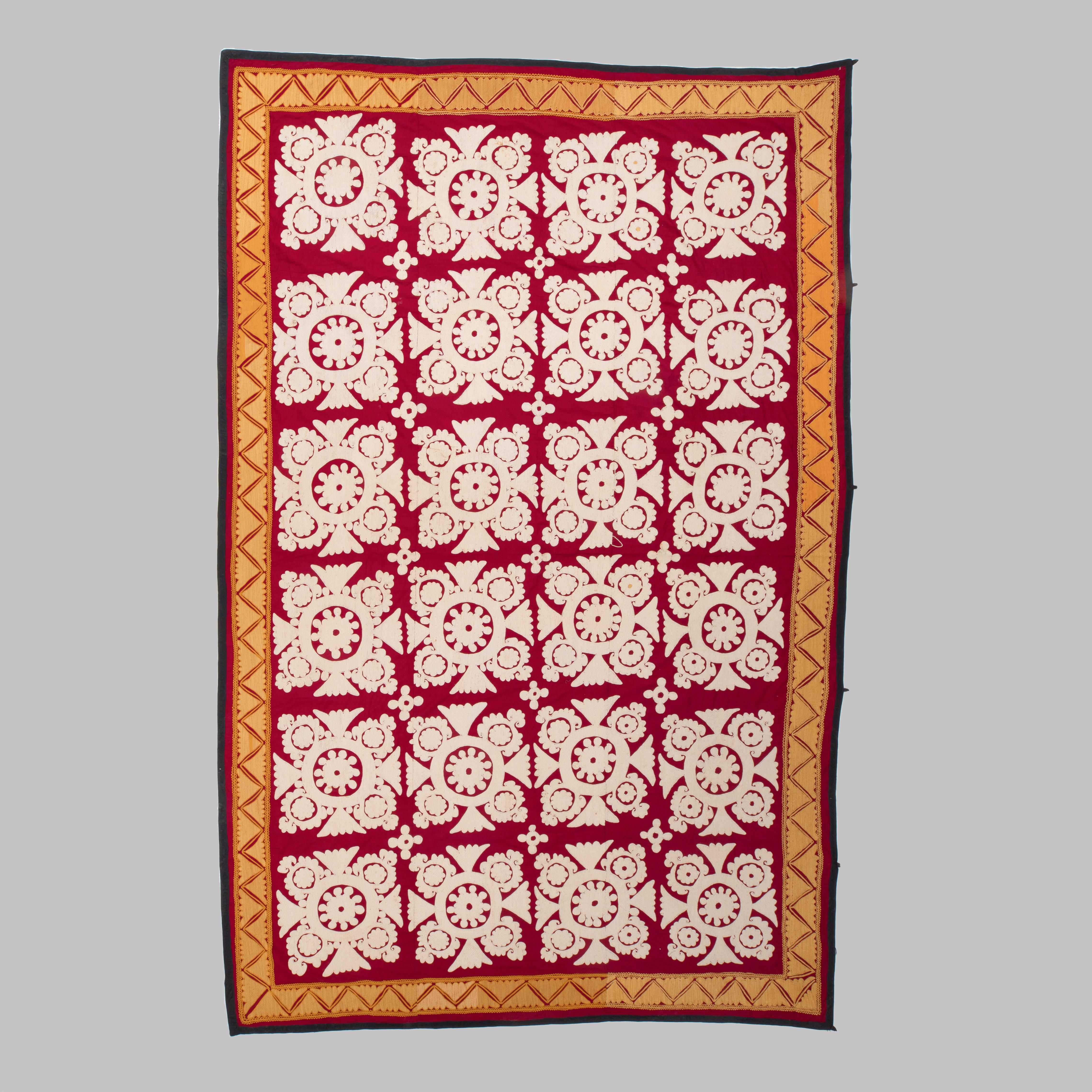 A large suzani in cotton from Uzbekistan from mid 20th century.
