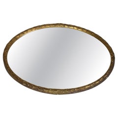 Decorative Regency style circular gilded laurel leaf mirror; c. 1820