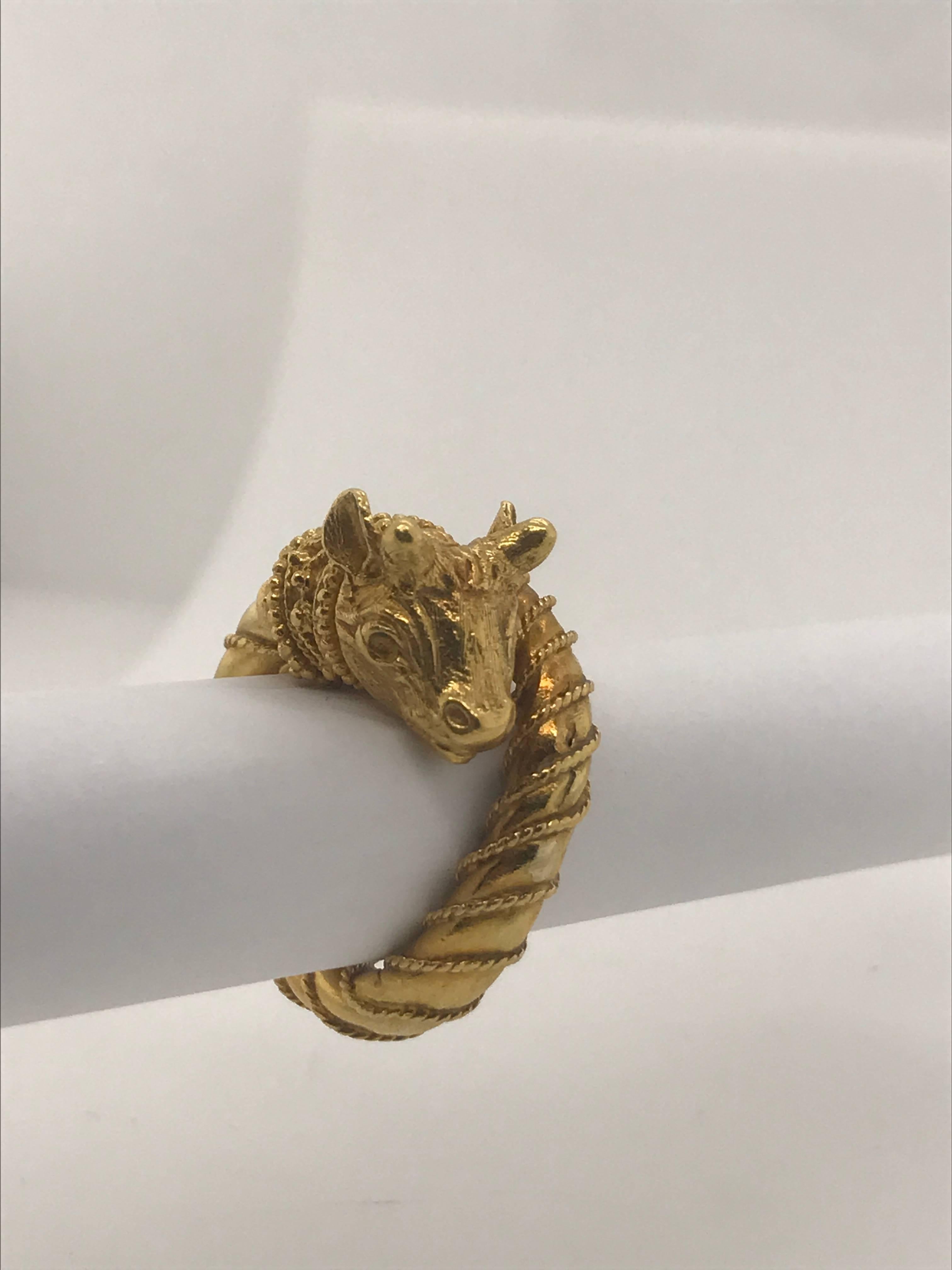 Ram's head decorative ring in 22K yellow gold Designed by Greek designer Zolotas. This ring likely cannot be sized as has a slightly 