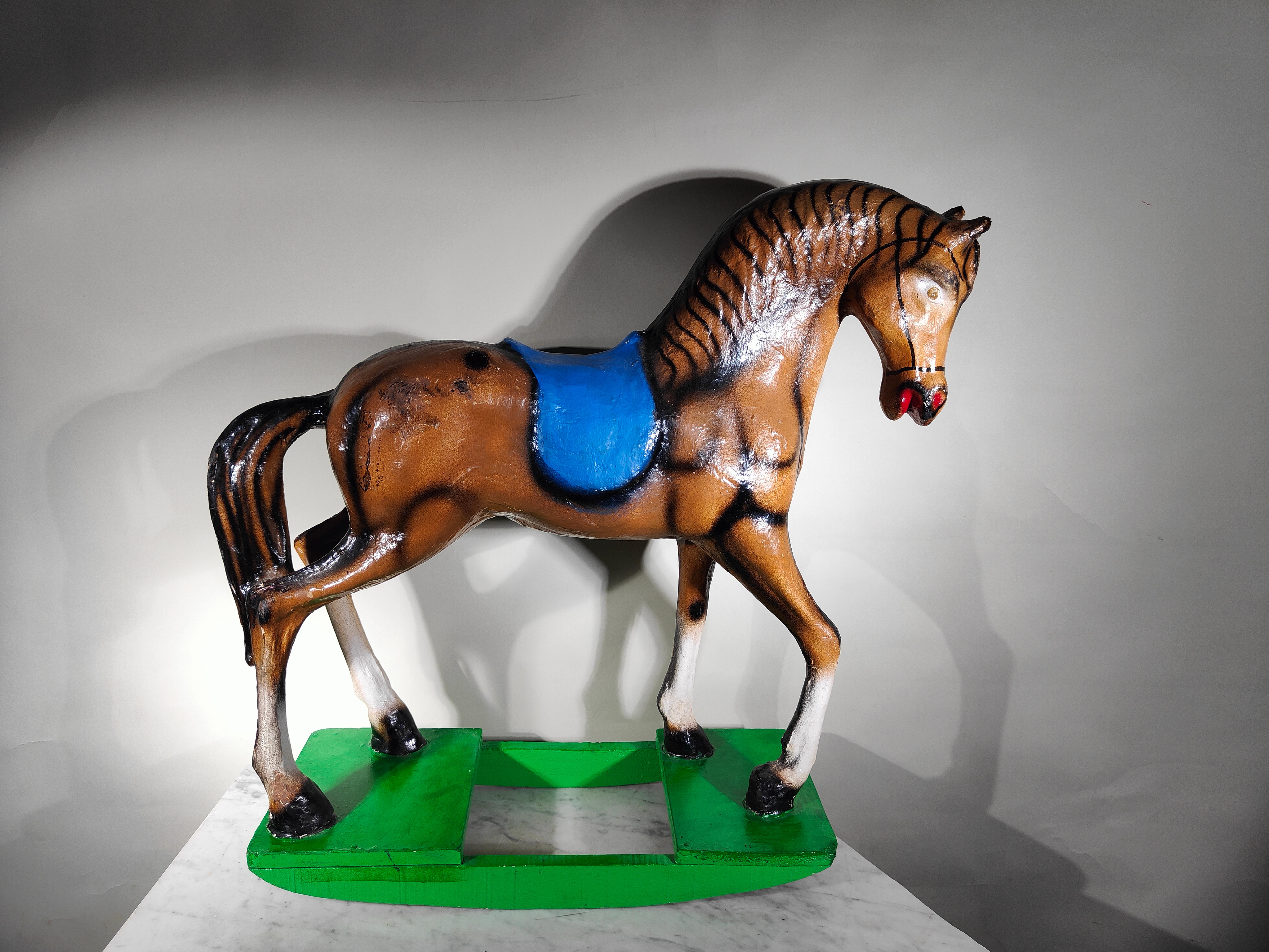 Decorative rocking horse made of papier-mâché, 1950s
Measurements: 70 x 28 x 59 cms.