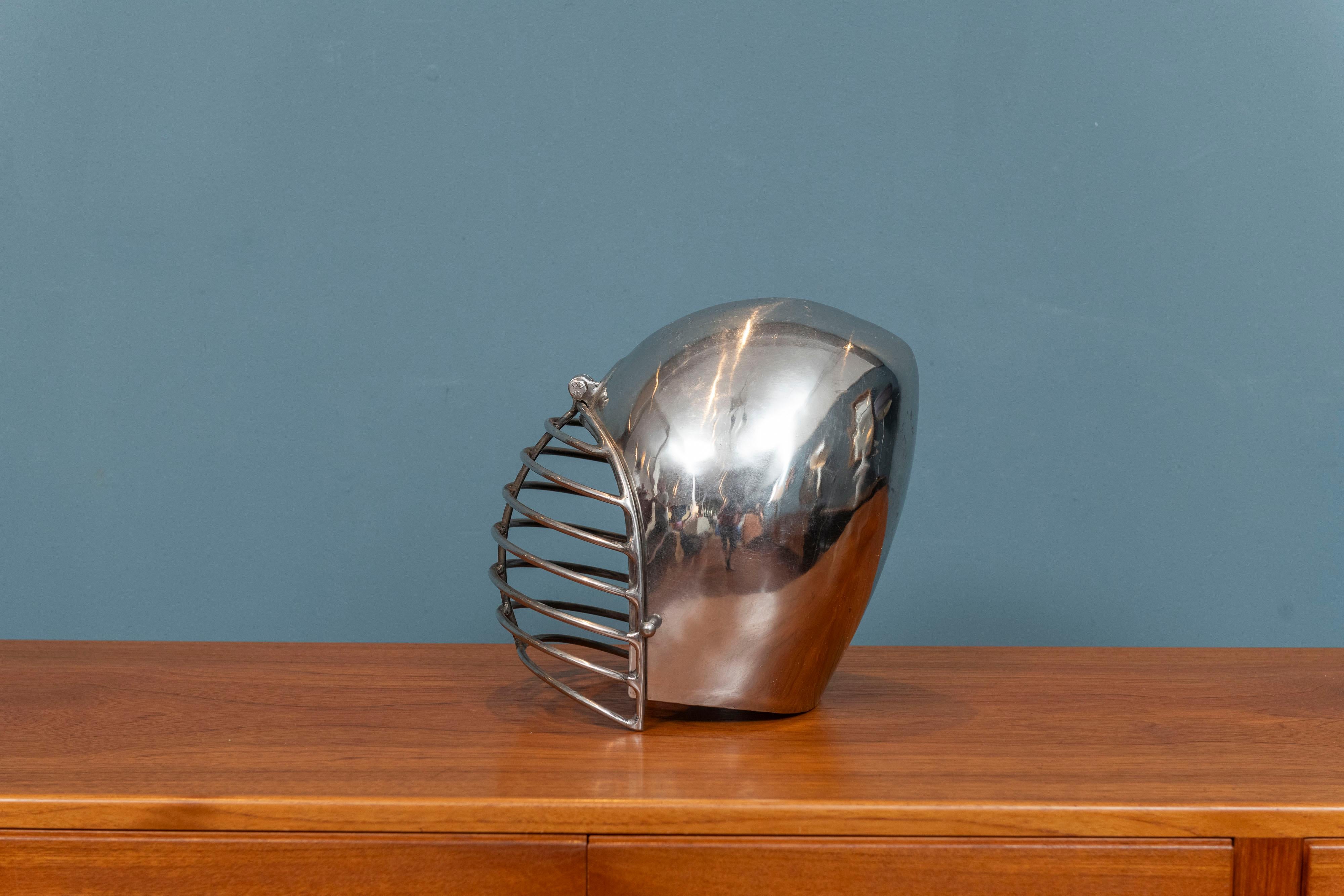 Decorative Roman Style polished metal helmet. Fun accessory for your office or man cave. Heavy solid construction steel helmet, a great addition to your home decor.