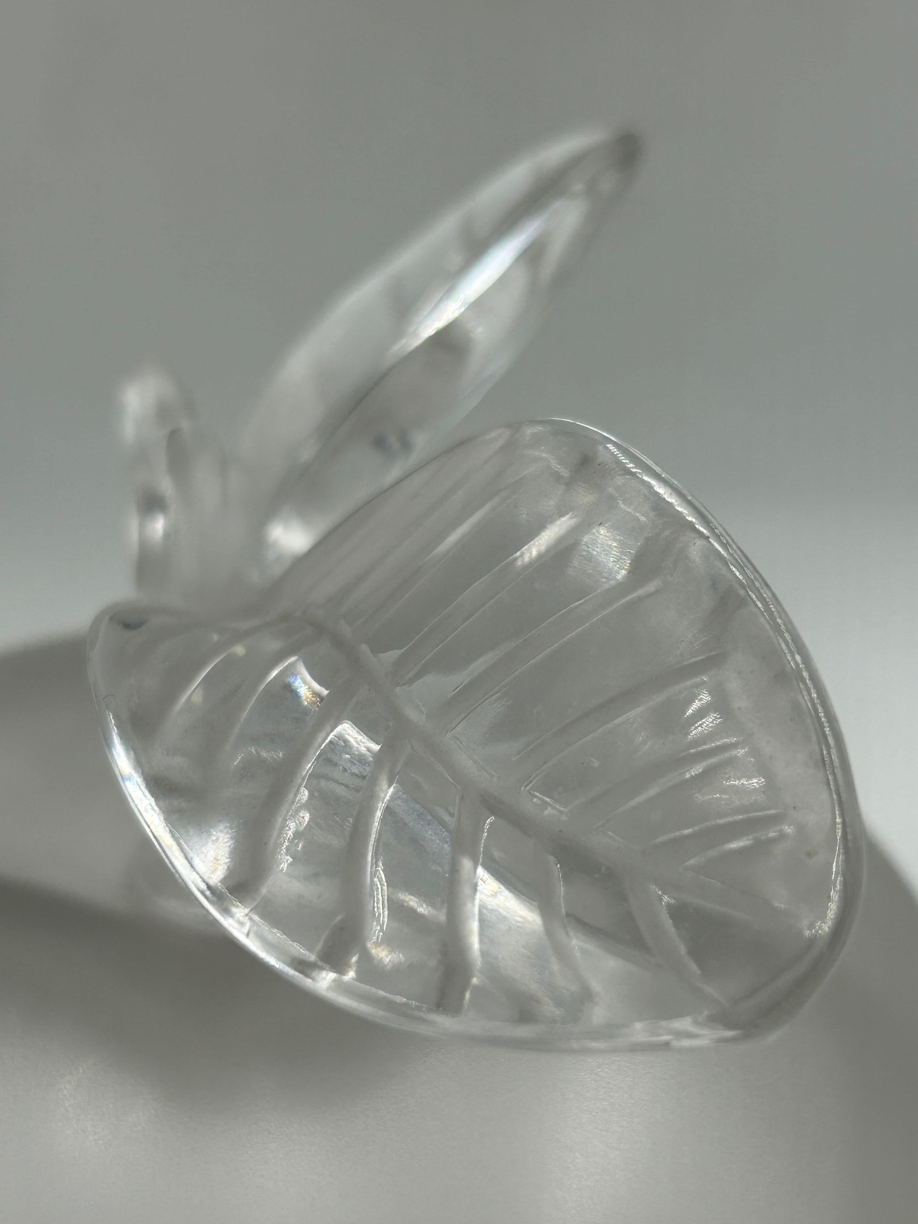 Lalique Crystal Apple-Shaped Decorative Sculpture
Elegant Lalique crystal sculpture from France, depicting an apple with leaves. Made of satin-finished and polished crystal, with a translucent frosted body and finely modeled transparent leaves. The