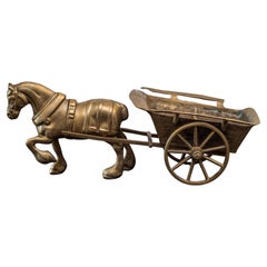 Decorative sculpture of a horse with a carriage