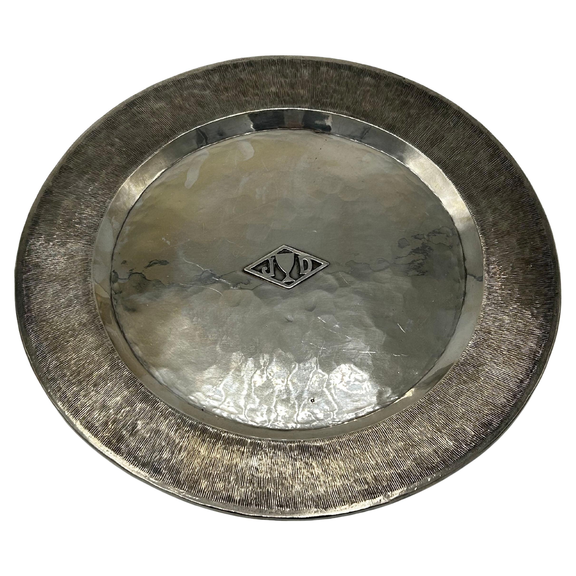 Decorative silver metal plate by Jean Despres For Sale