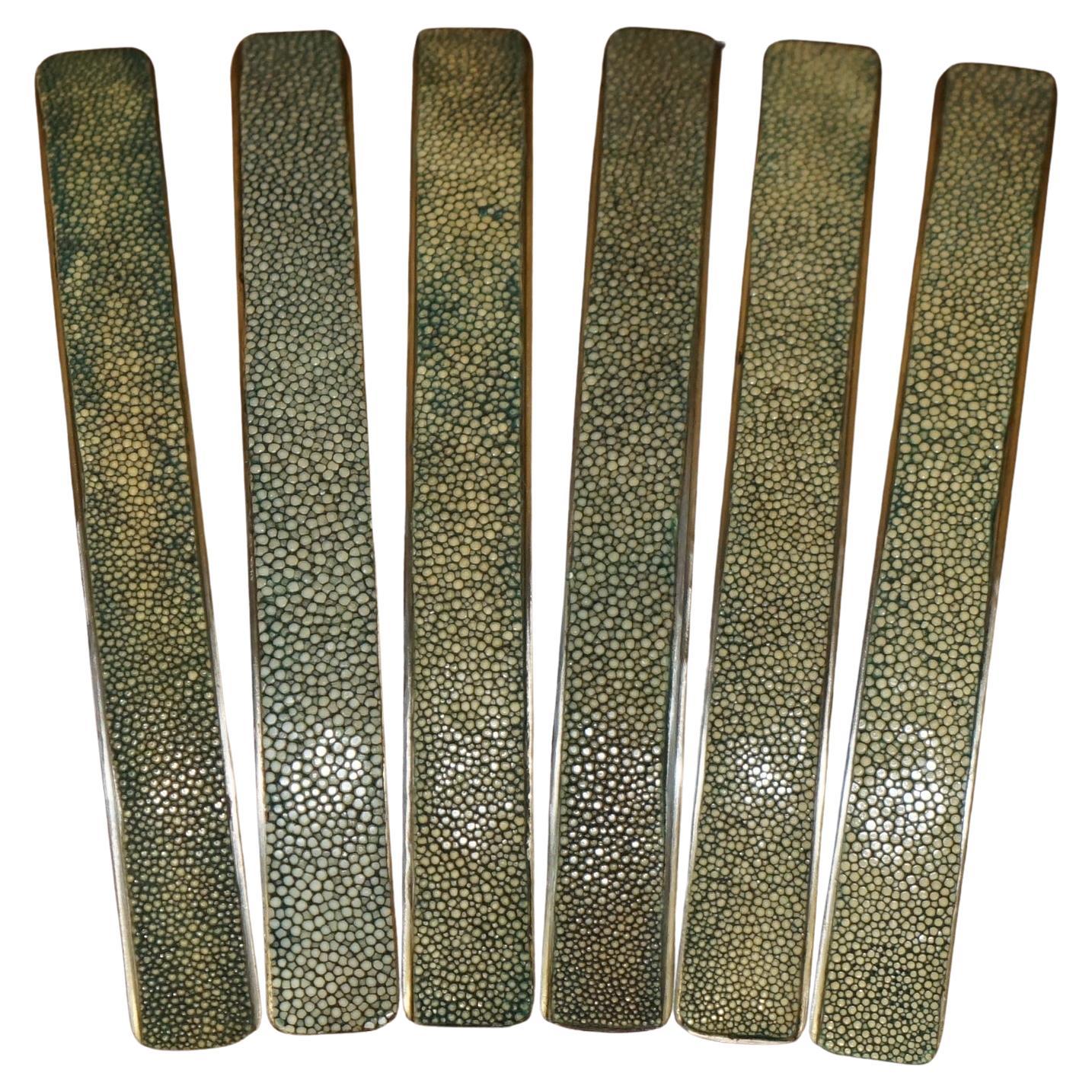 Royal House Antiques

Royal House Antiques is delighted to offer for sale this very rare suite of six Shagreen upholstered drawer handles

Shagreen is super collectable, it is basically manta ray or shark skin

I bought these with a view to using