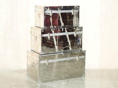 DECORATIVE SUiTE OF THREE PROGRESSIVE SIZED CHROME & STEEL STORAGE TRUNK CHESTs