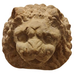 Cabeza de león decorativa de terracota