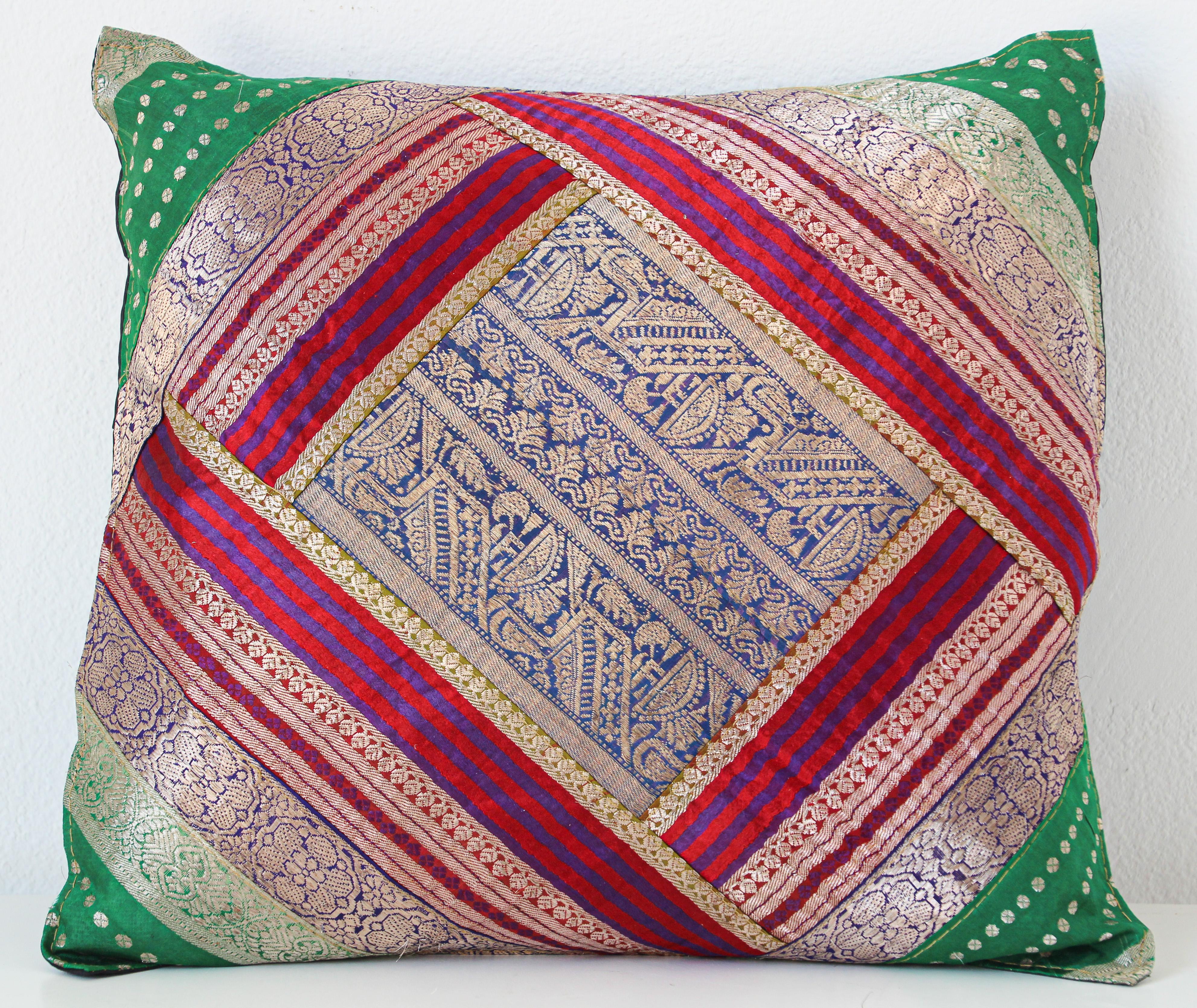 Decorative accent throw pillow made from vintage silk sari borders.
One of a kind silk pillow in blue, green, gold, green, purple with metallic threads silk saris borders.
Handcrafted in India.
We do have multiple in this style, but each one is