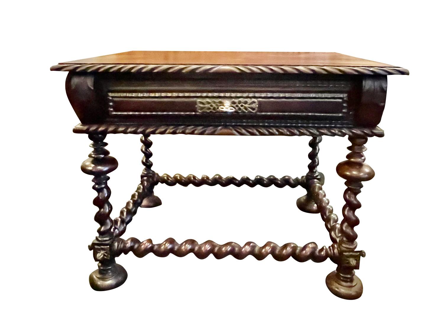 18th century Portuguese side table with two drawers.
Unusual smaller size makes a great side table.
Classic decorative trim with ornate brass details.
Barley twist legs and stretcher.
Palissandre wood.